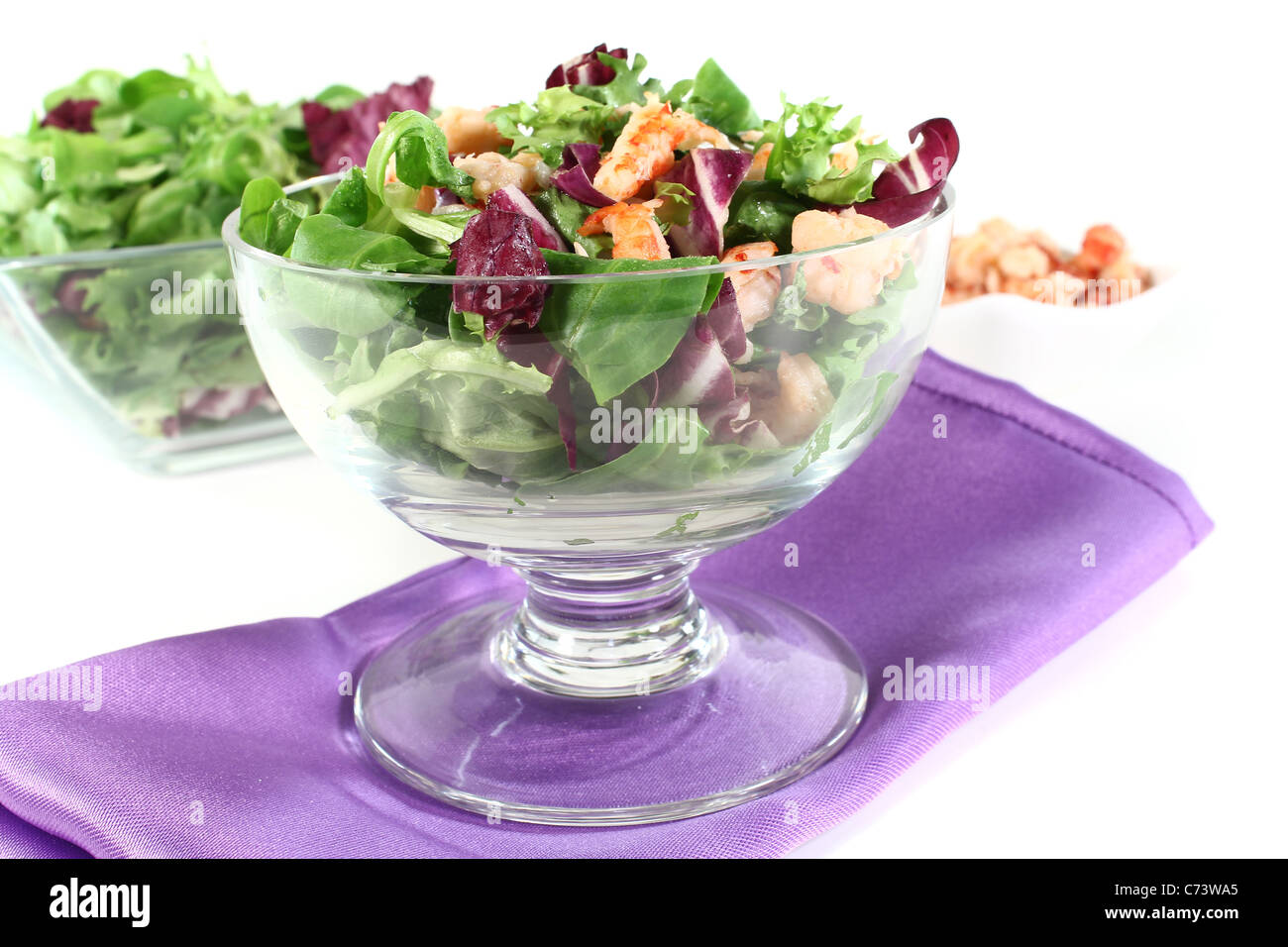 Mixed salad with crayfish on a white background Stock Photo