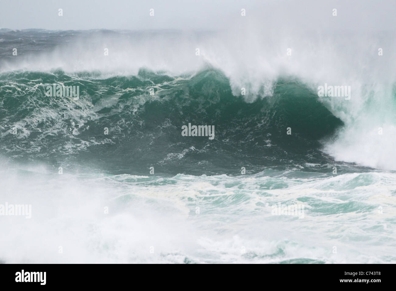 Atlantic Storm Waves breaking on rocky shore Porthnahaven, Islay Scotland, UK LA005442 Stock Photo