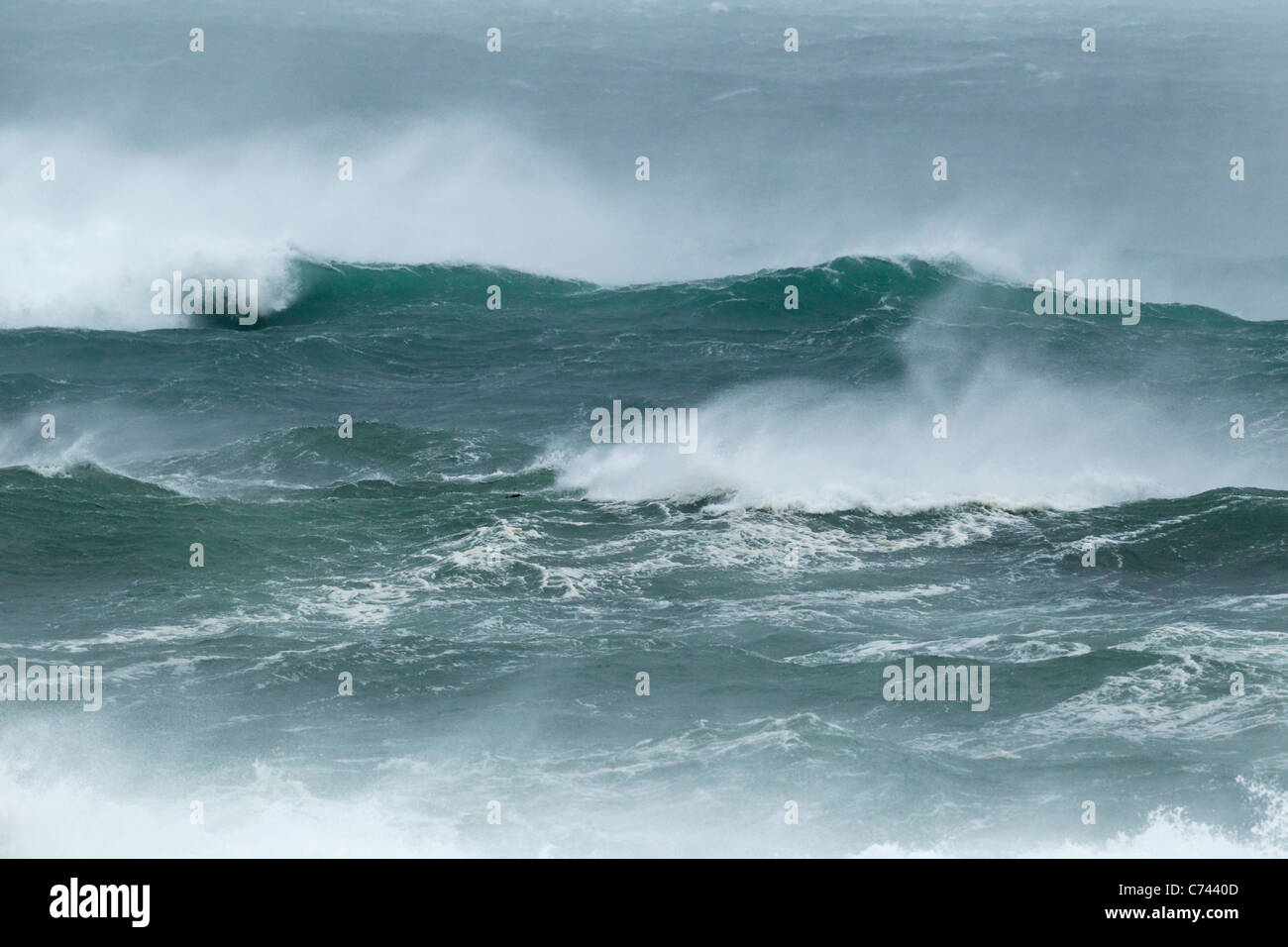 Atlantic Storm Waves breaking on rocky shore Porthnahaven, Islay Scotland, UK LA005455 Stock Photo