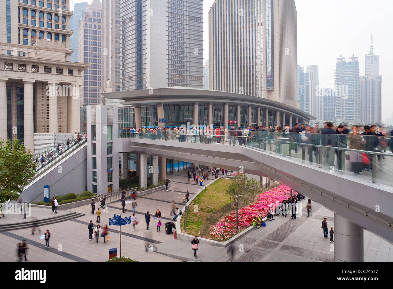 People on an elevated walkway, Century Avenue, Pudong, Shanghai, China Stock Photo
