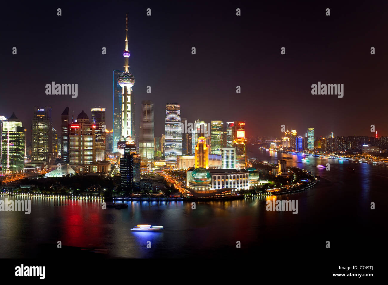 New Pudong skyline looking across the Huangpu River from the Bund Shanghai China Stock Photo