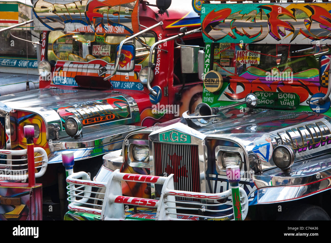 Colourful jeepneys on the streets of Manila, Philippines, close to Boni Avenue and EDSA Stock Photo