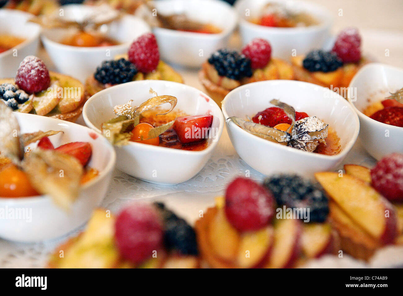 close up of fruit dessert in small bowls at wedding buffet, germany