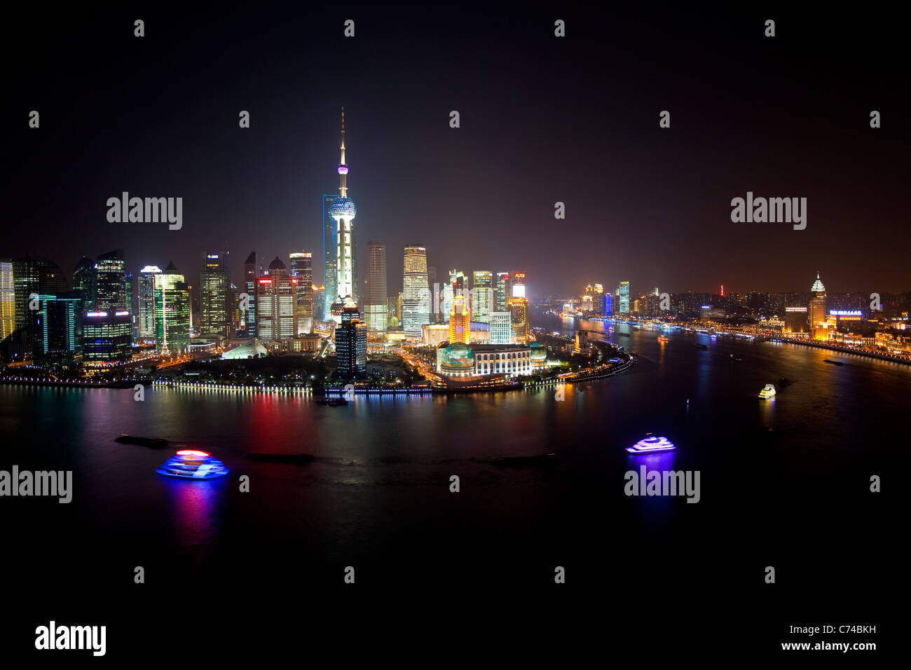 New Pudong skyline looking across the Huangpu River from the Bund Shanghai China Stock Photo