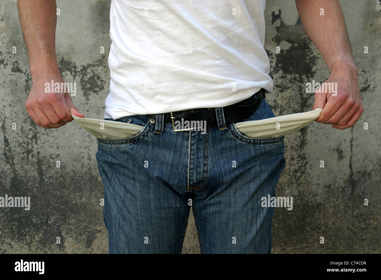 Man with empty pockets Stock Photo Alamy