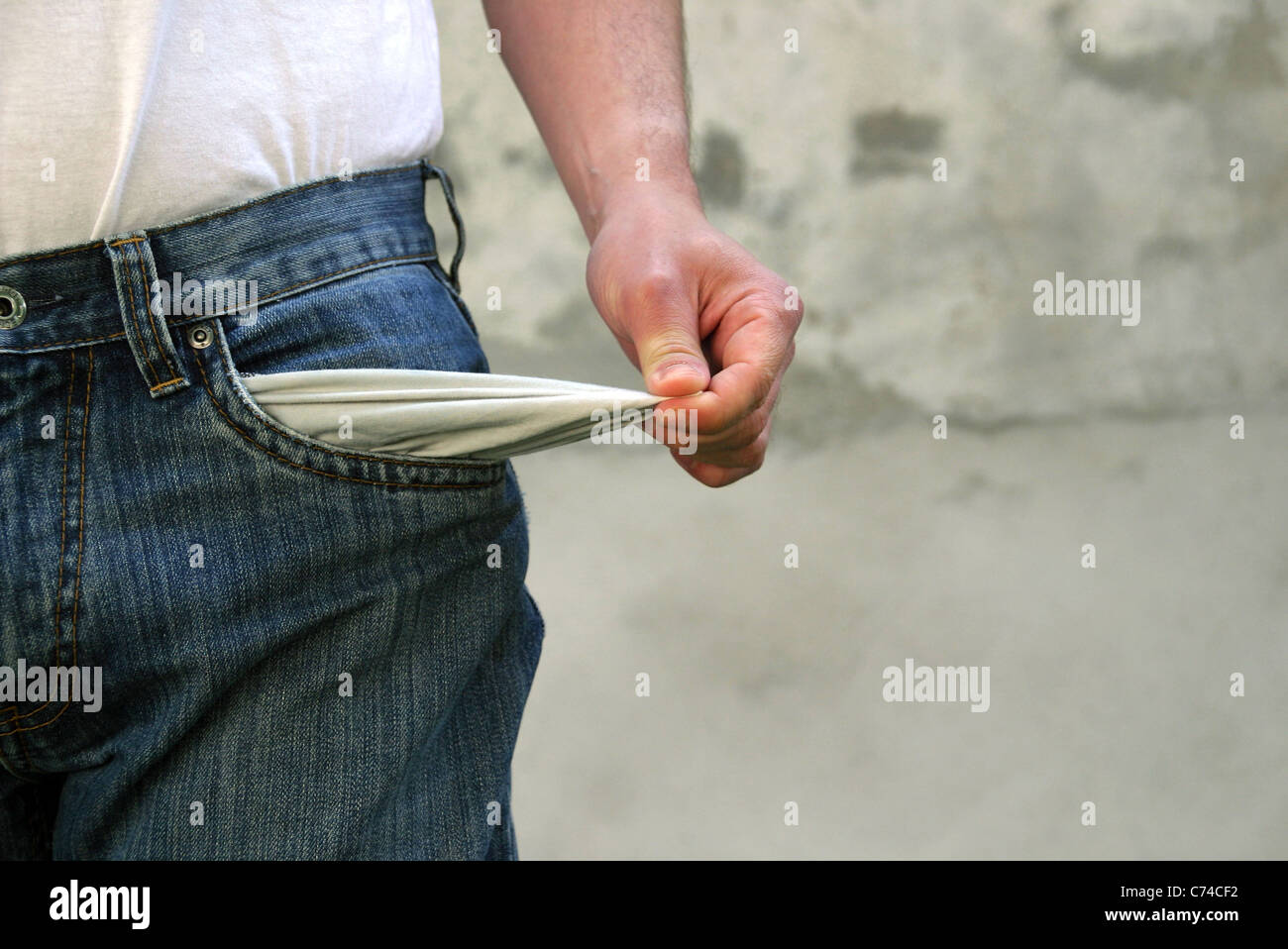Man with empty pockets Stock Photo Alamy