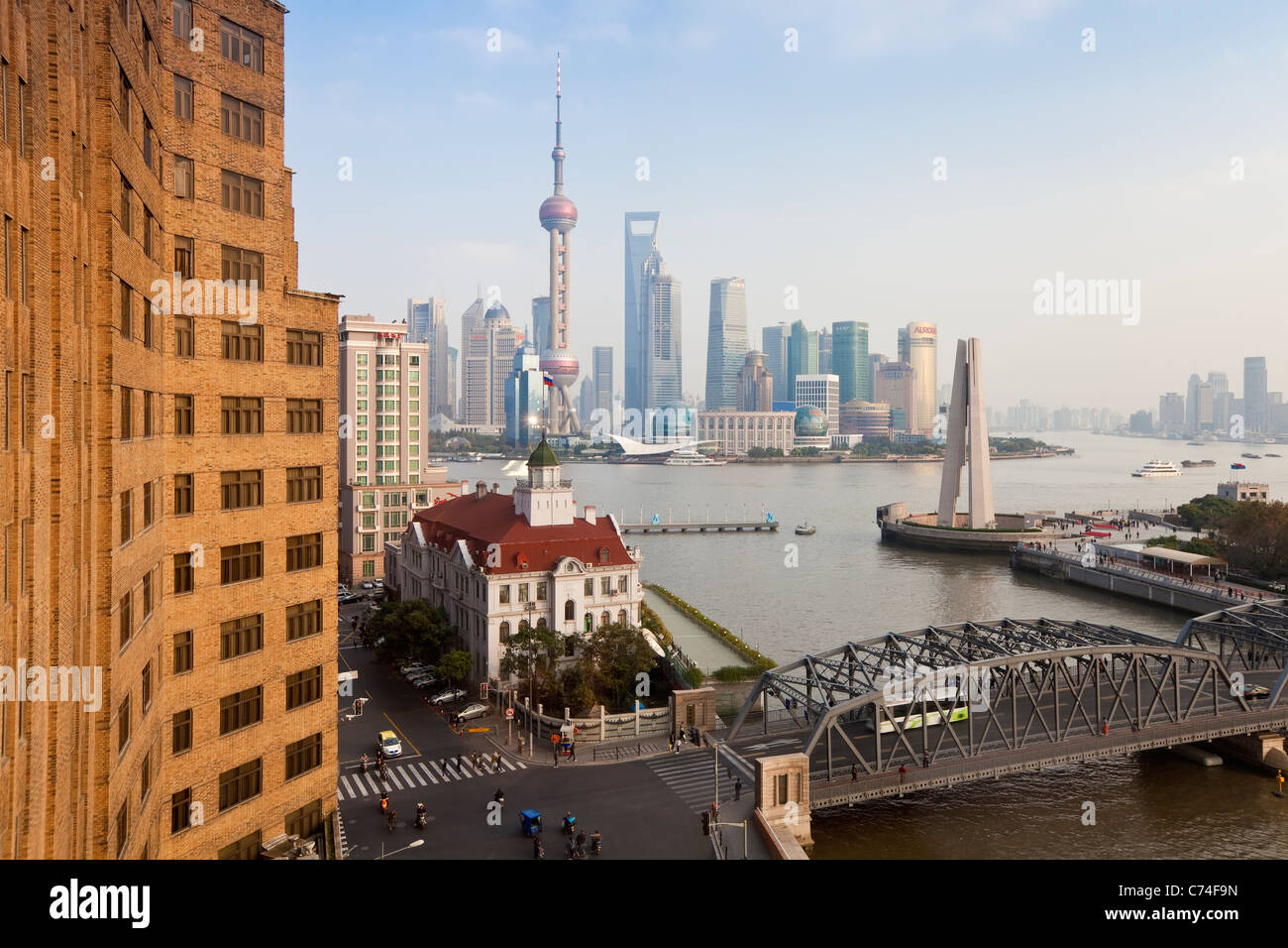 New Pudong skyline Waibaidu (Garden) Bridge looking across the Huangpu River from the Bund Shanghai China Stock Photo