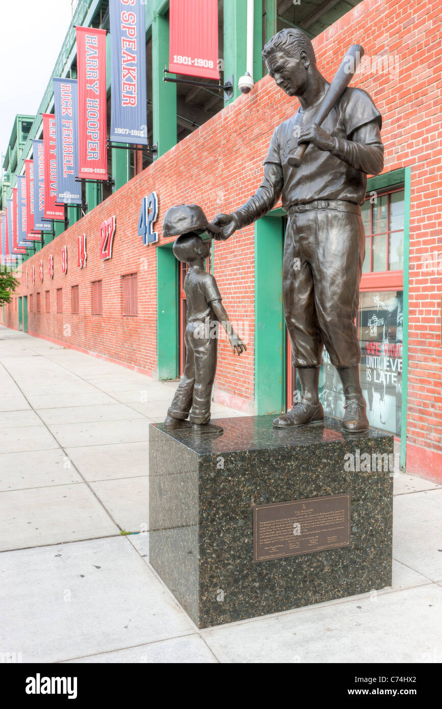 A statue of baseball great Ted Williams outside Fenway Park on Van Ness Street in Boston, Massachusetts. Stock Photo