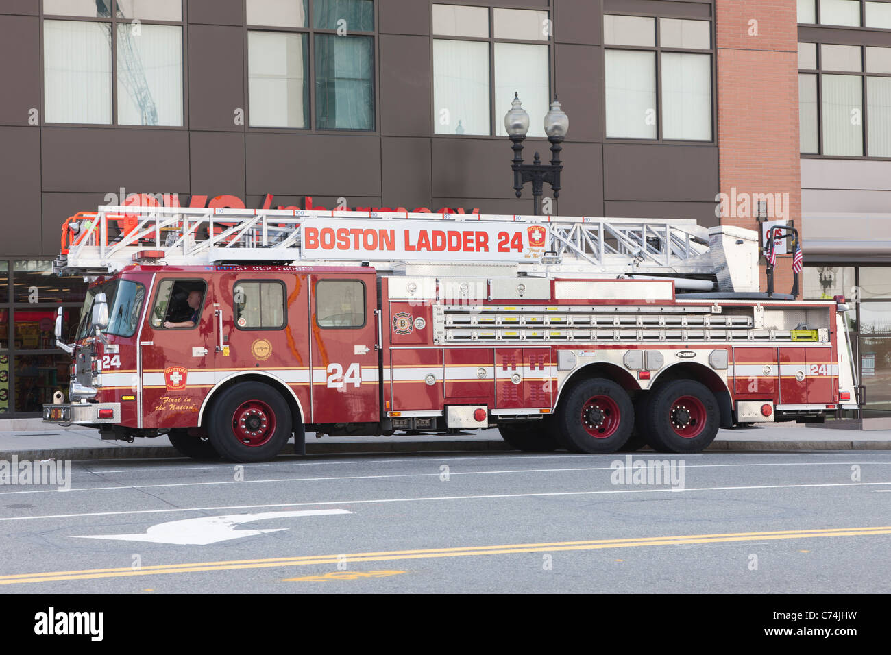 Boston Fire Department Ladder 24 responding to a call on Causeway Street, Boston, Massachusetts Stock Photo