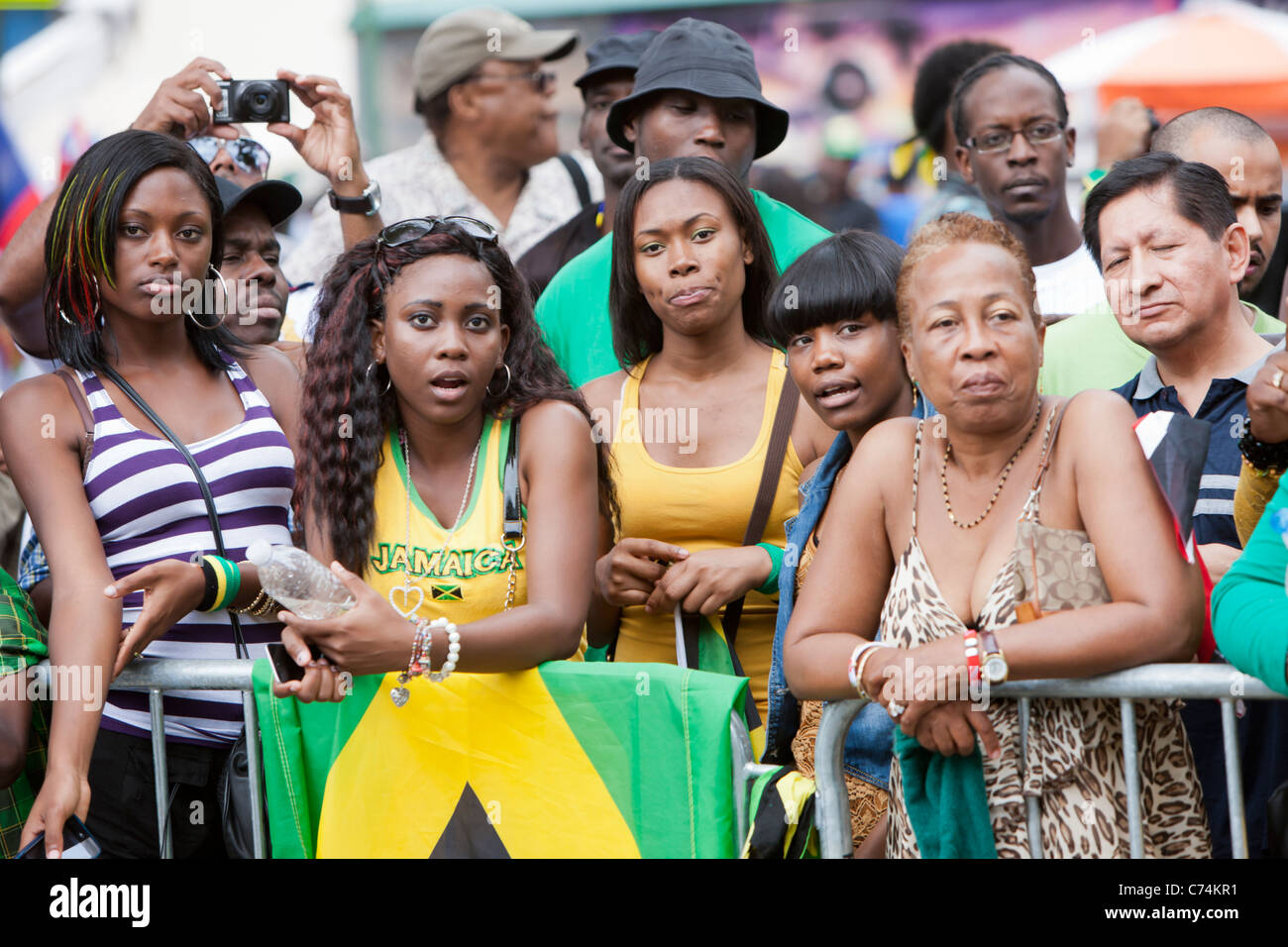 Spectators watch the West IndianAmerican Day Parade in along the