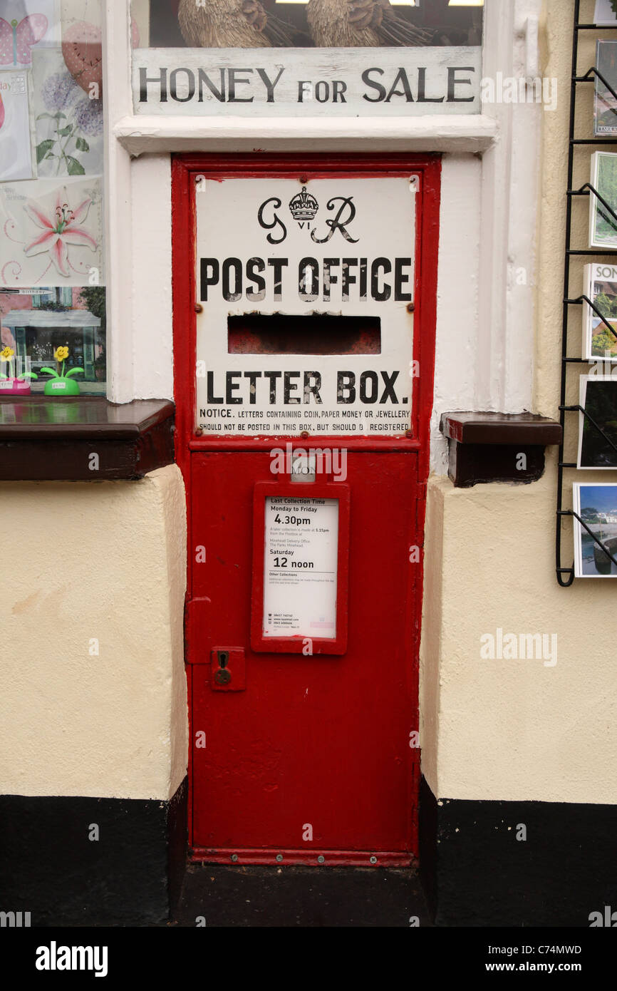 Royal Mail Post Box in wall outside Dunster Village Post Office in High
