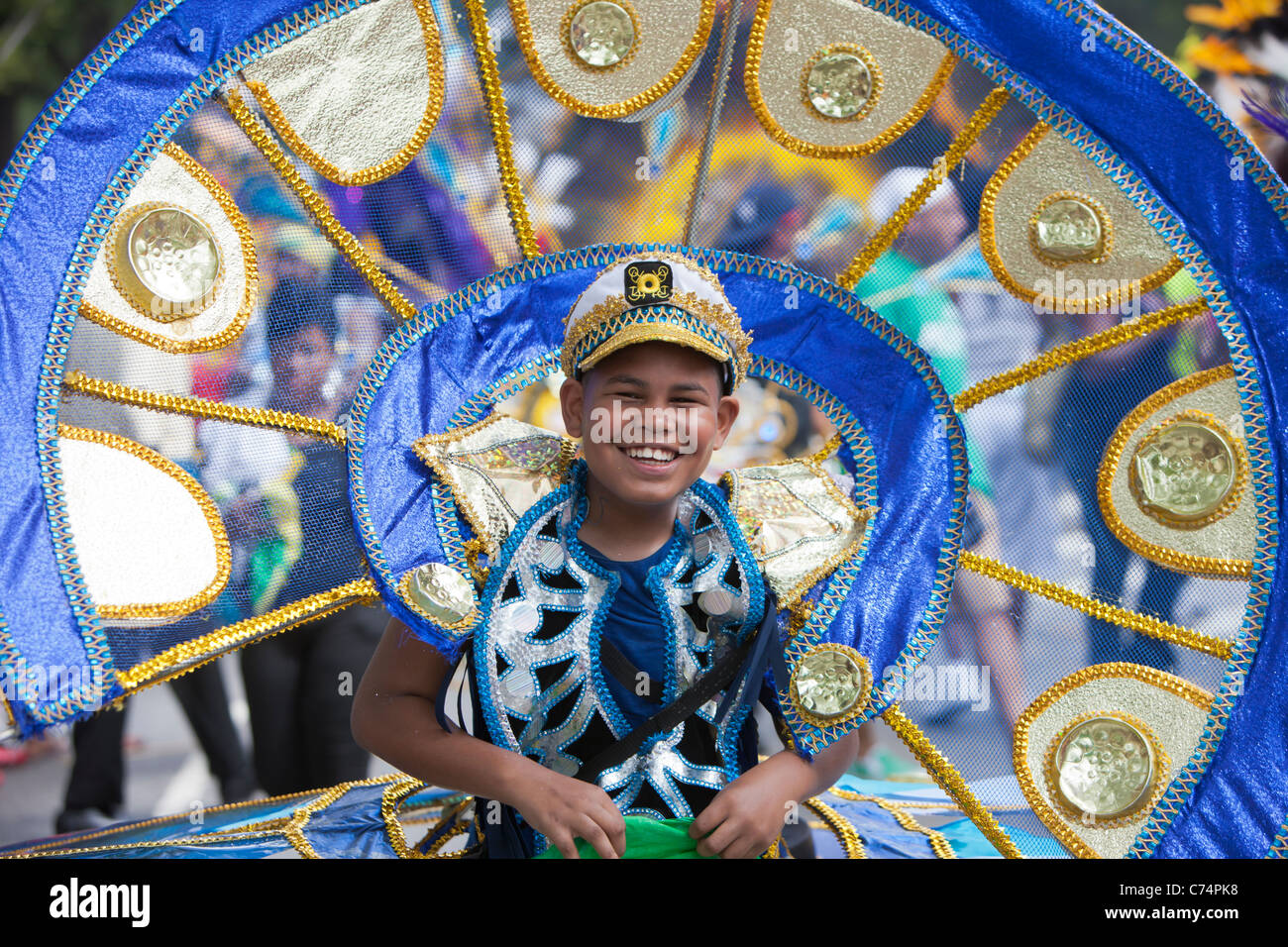 A parade participant in festive attire at the West Indian-American Day Parade in New York City. Stock Photo