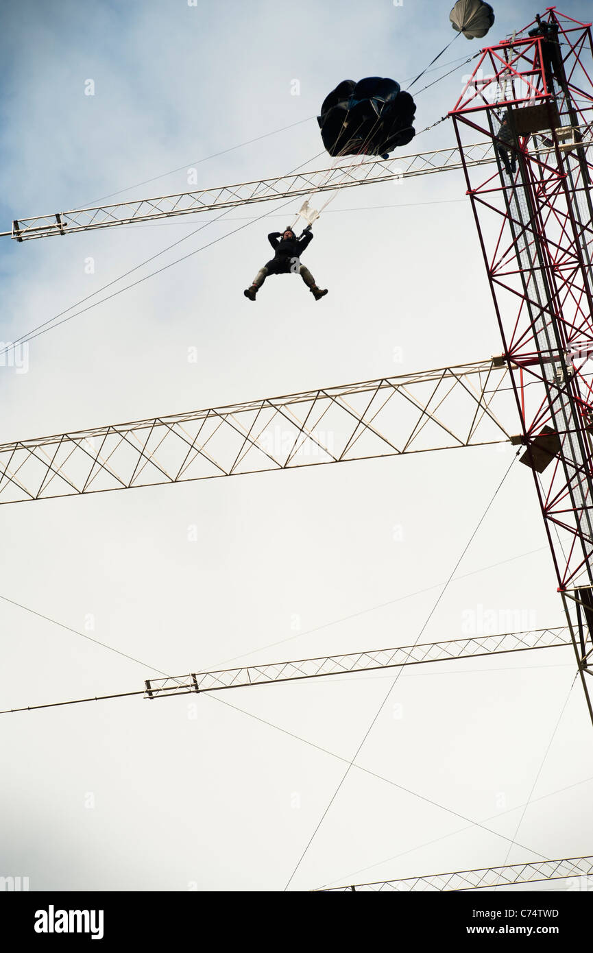 A base jumper taking off from on radio amateur antenna in Oulu, Finland
