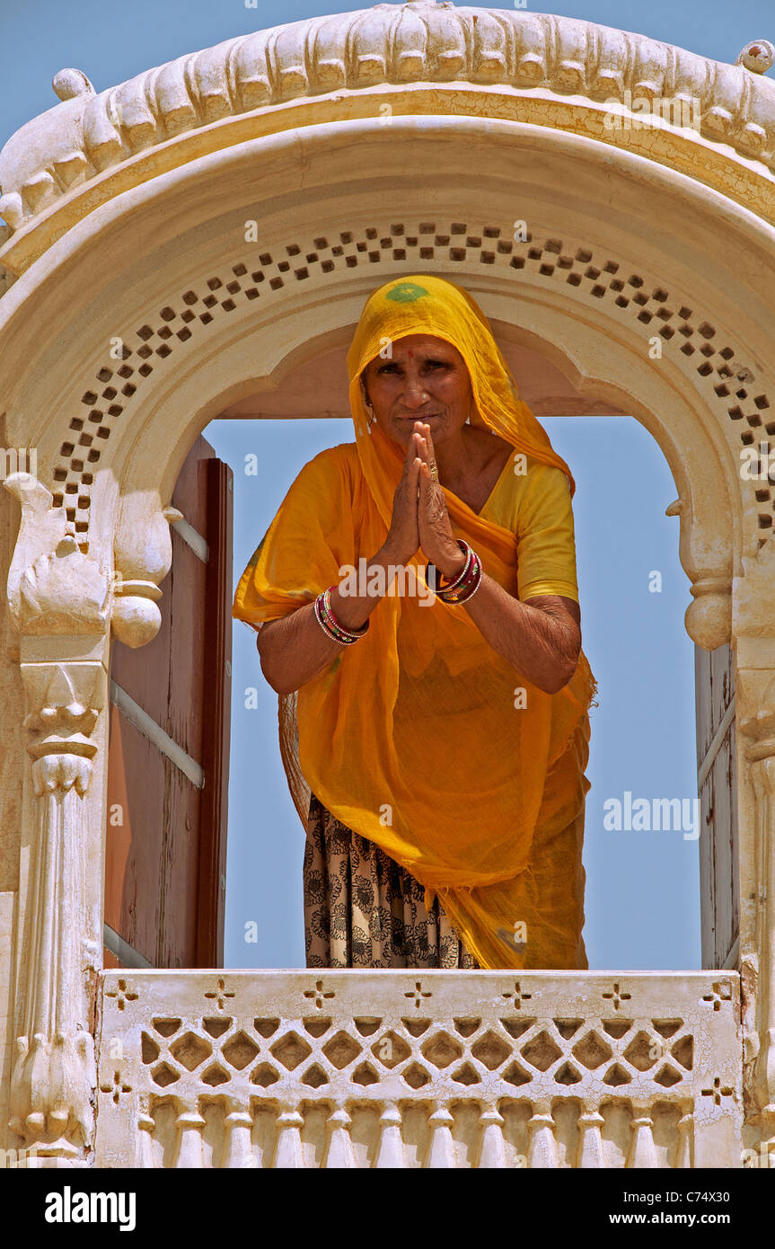 Woman making greeting gesture Junagarh Fort Bikaner Rajasthan India Stock Photo