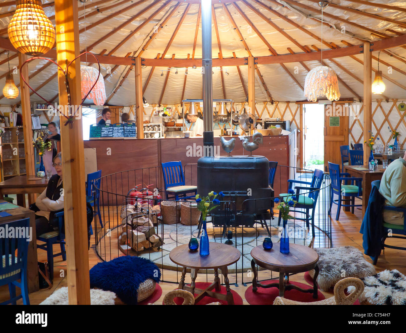 Interior of a restaurant in a traditional Mongolian Yurt At Thornham Norfolk UK Stock Photo