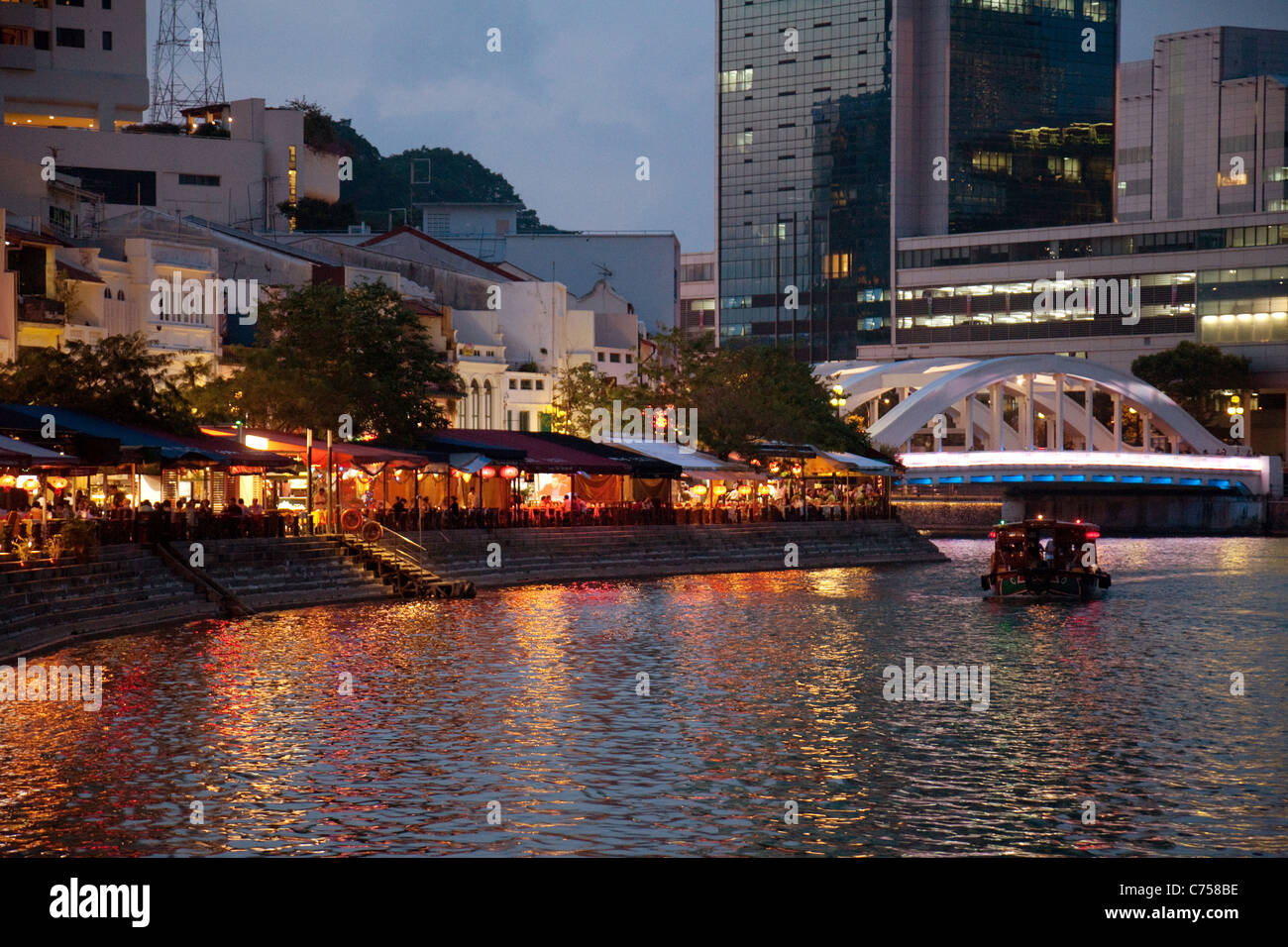 Restaurants at night along Boat Quay, and the Singapore river