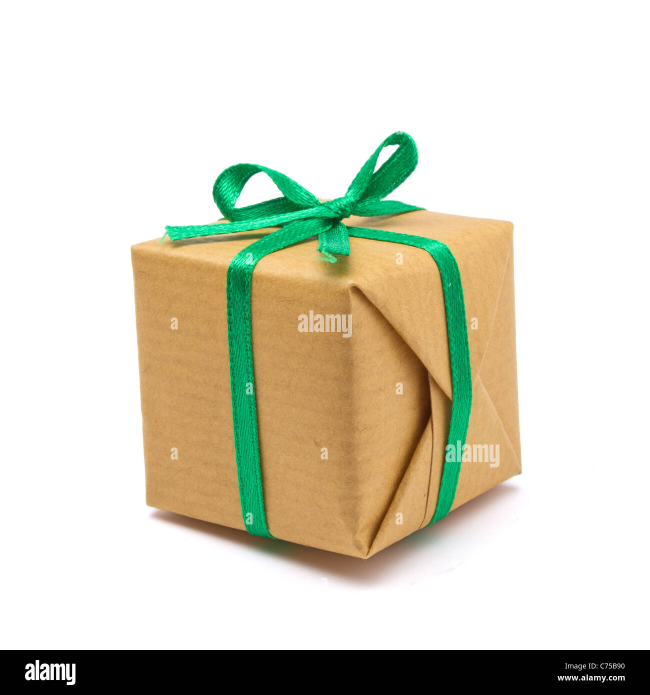 Single brown paper covered Gift box isolated on white background. Stock Photo