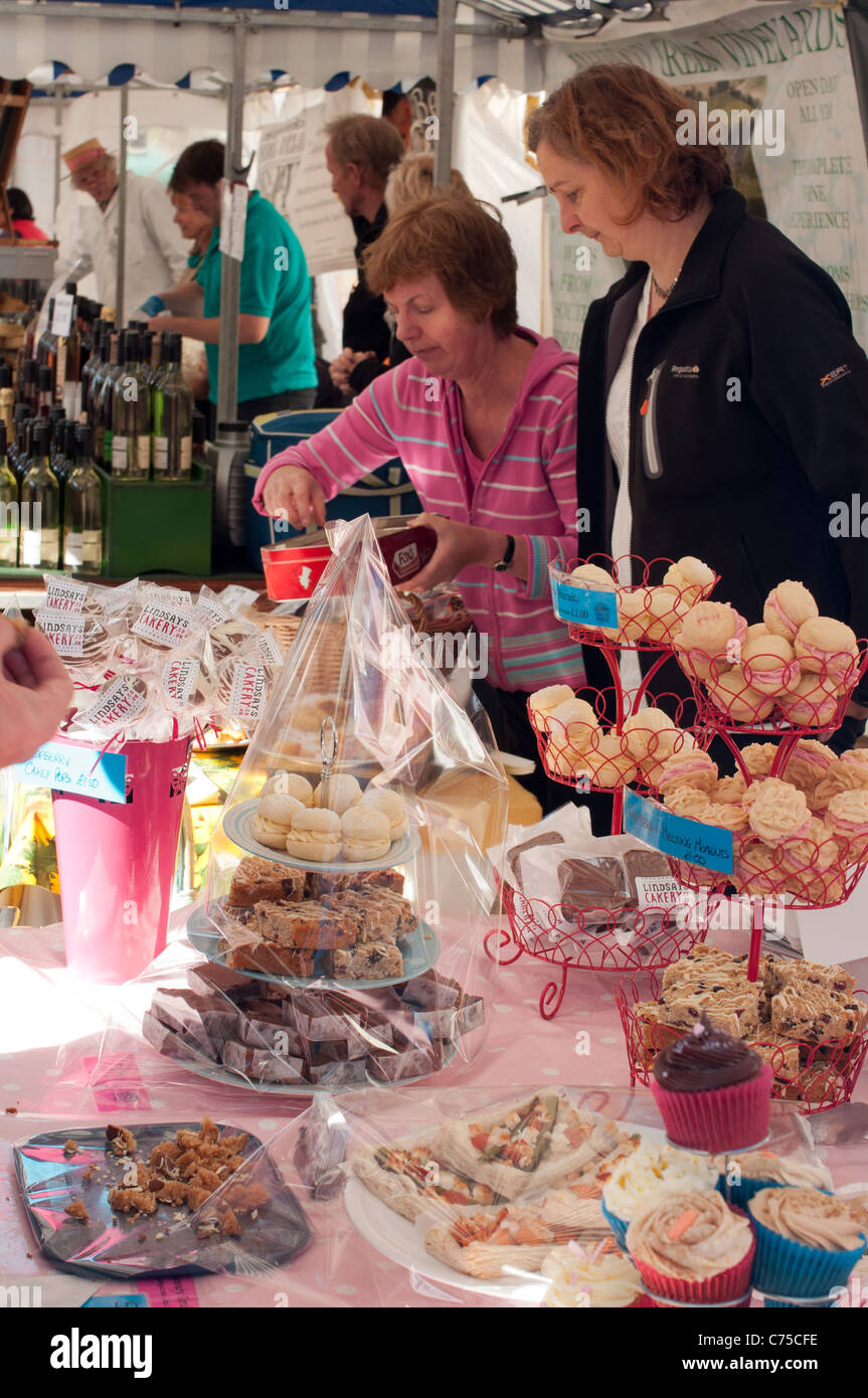 Stallholders selling their cakes at Ludlow Food Festival, September 11, 2011 Stock Photo