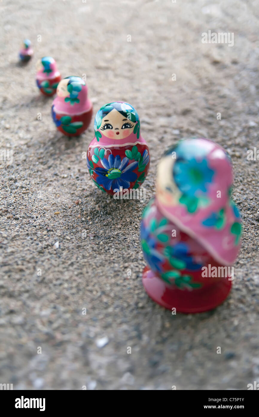 russian dolls in a row, shallow DOF Stock Photo
