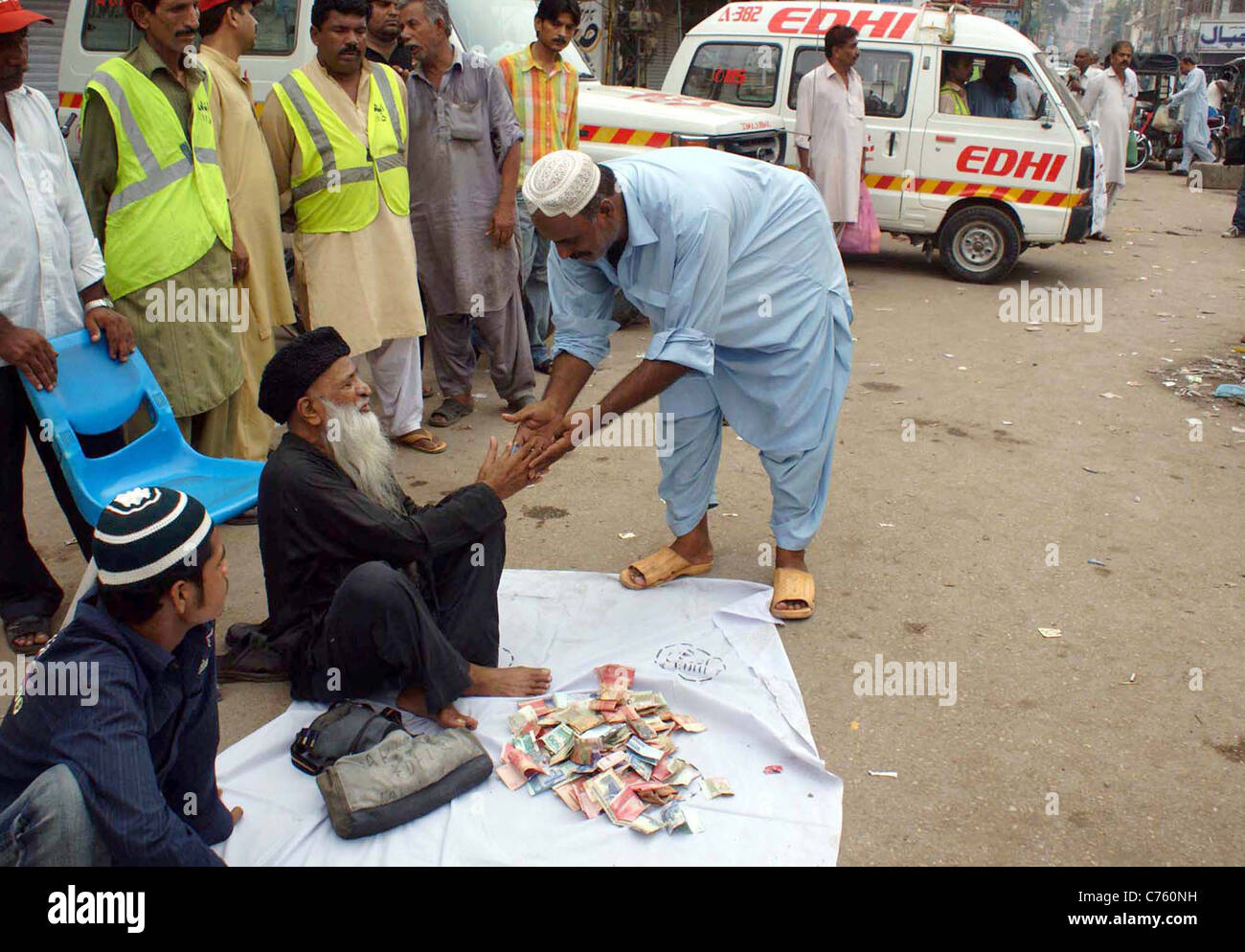 Renowned Social Worker, Abdul Sattar Edhi collects donations for rain ...