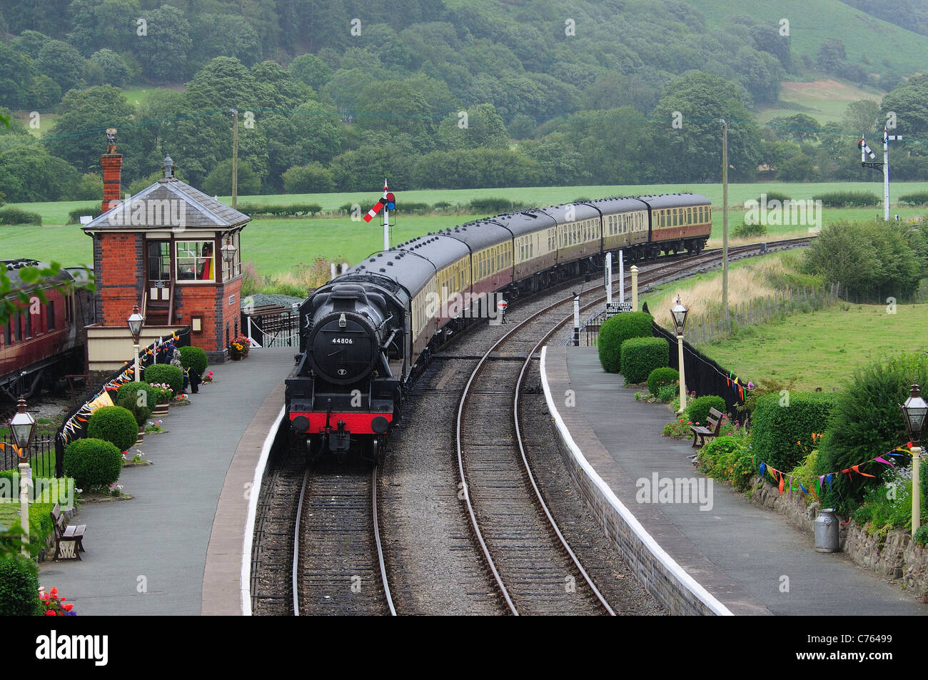 Llangollen steam train arriving at Carrog station North Wales UK Stock