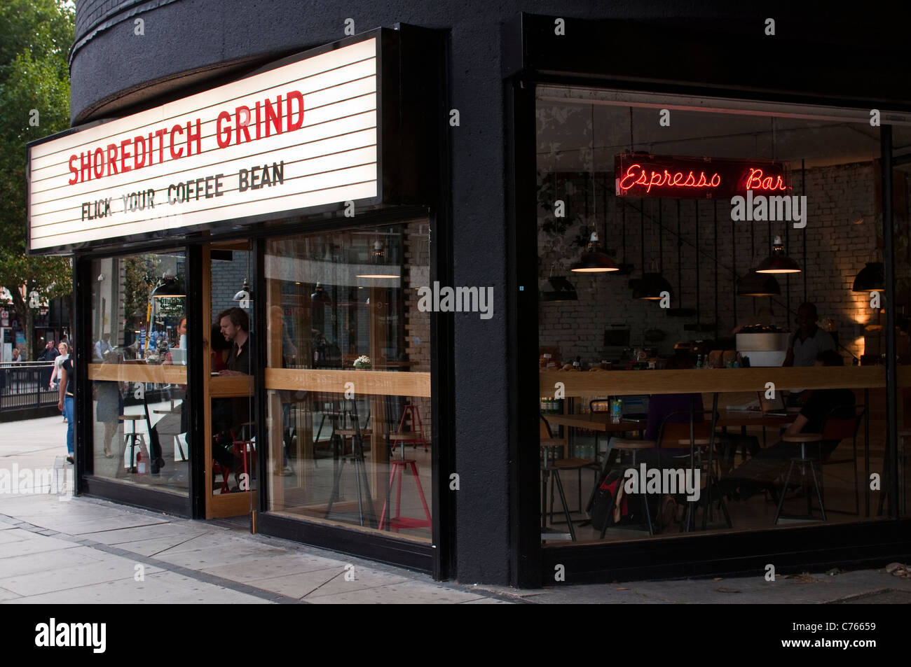 The exterior of the Shoreditch Grind espresso bar, a new cafe in East London on Old Street roundabout, London. Stock Photo