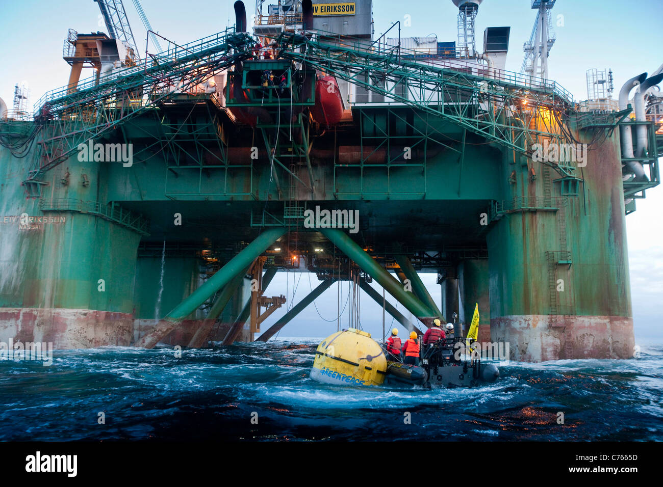 direct action against the exploratory drill rigLEIV EIRIKSSON  by Greenpeace off the coast of Greenland - occupation of Drill P Stock Photo