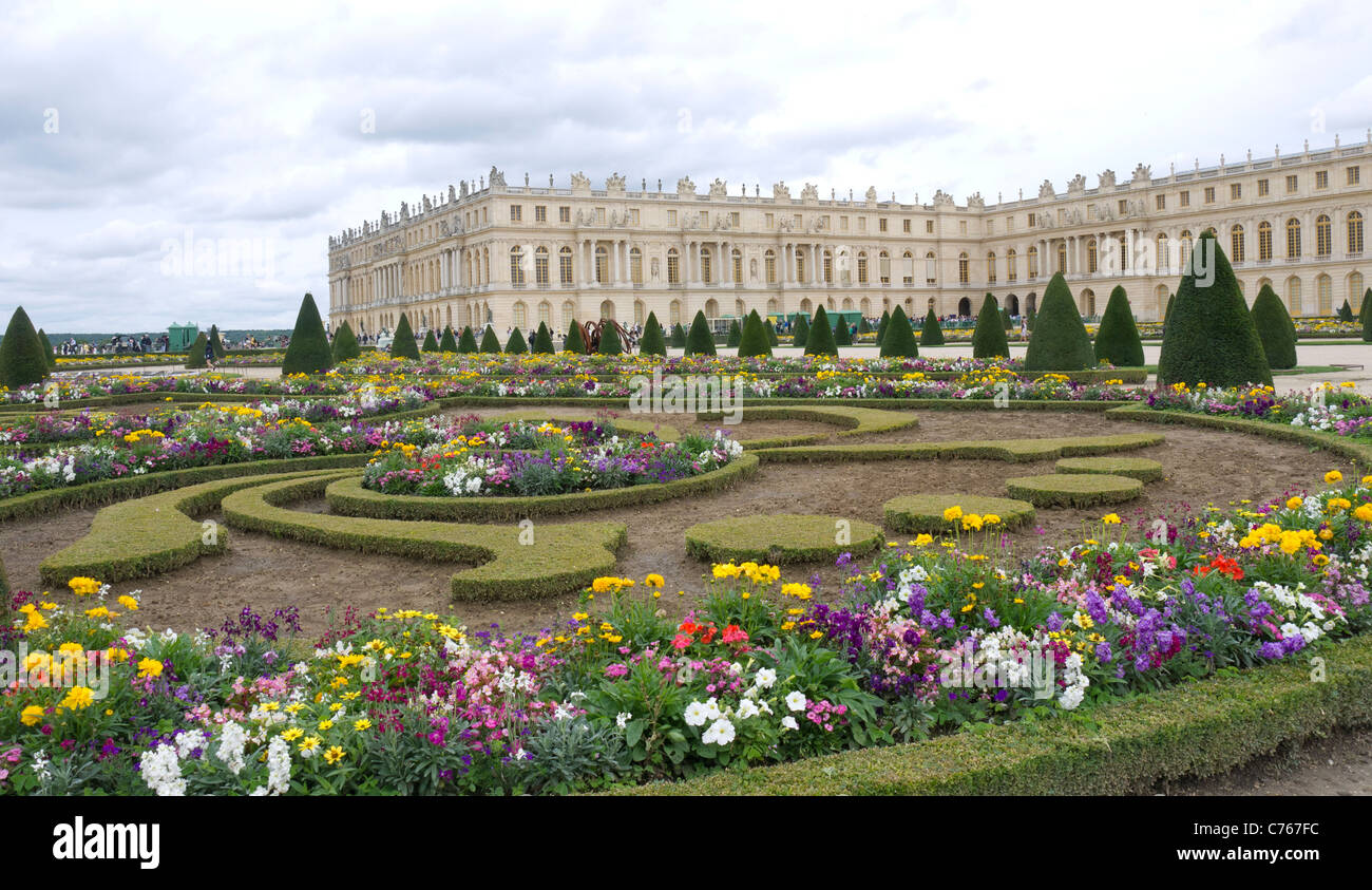 The Chateau of Versailles, Paris France. Flower beds, the Parterre, the fountains Stock Photo