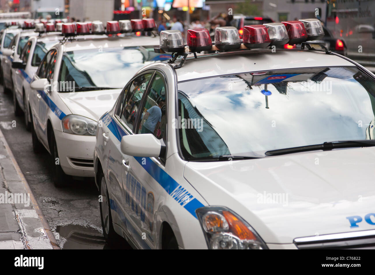 New York Police Department (NYPD) police cars line a street in New York City. Stock Photo