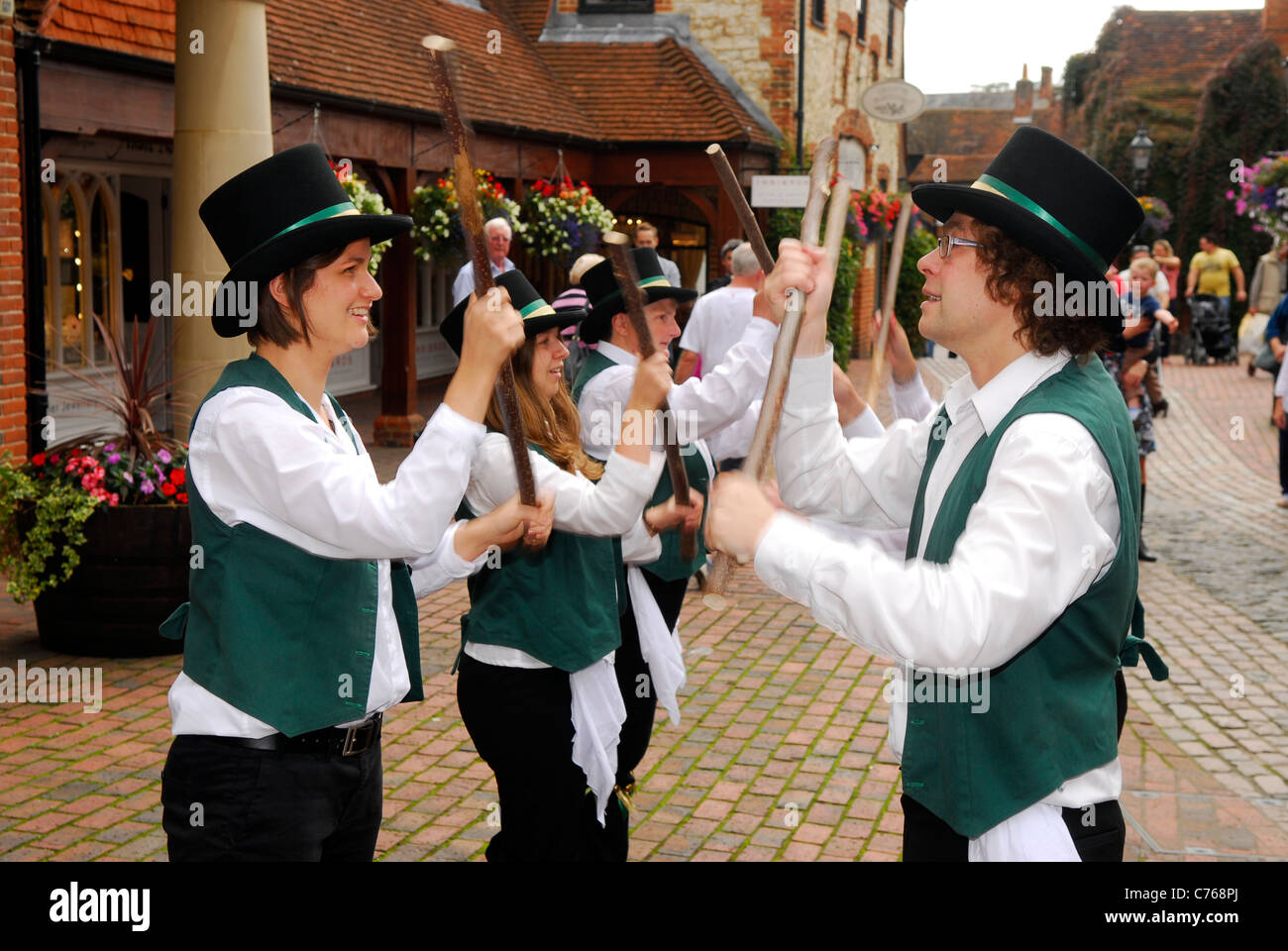 Morris dancers performing at a town Heritage Day, Lion & Lamb Yard, Farnham, Surrey, UK. Stock Photo