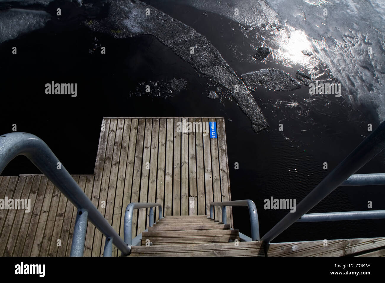 Most lakes get rid of their winter ice burden in Finland in late April. Stock Photo