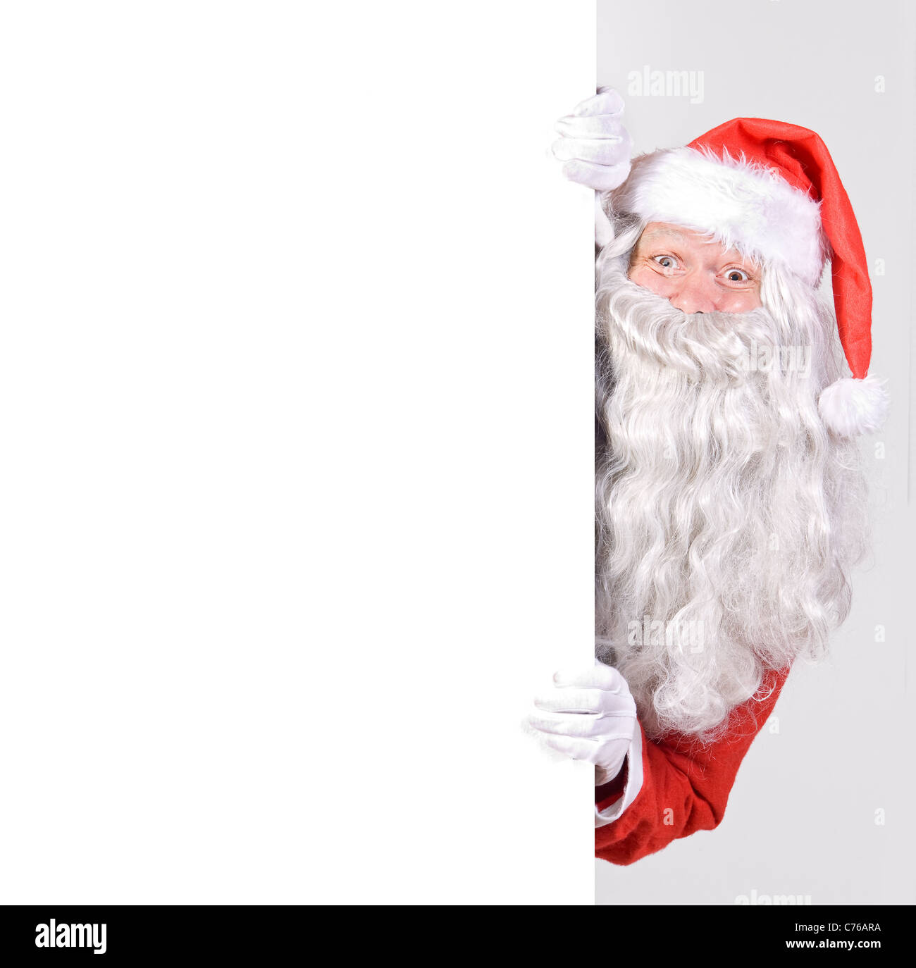 Santa Claus holding a blank sign isolated on white background Stock ...