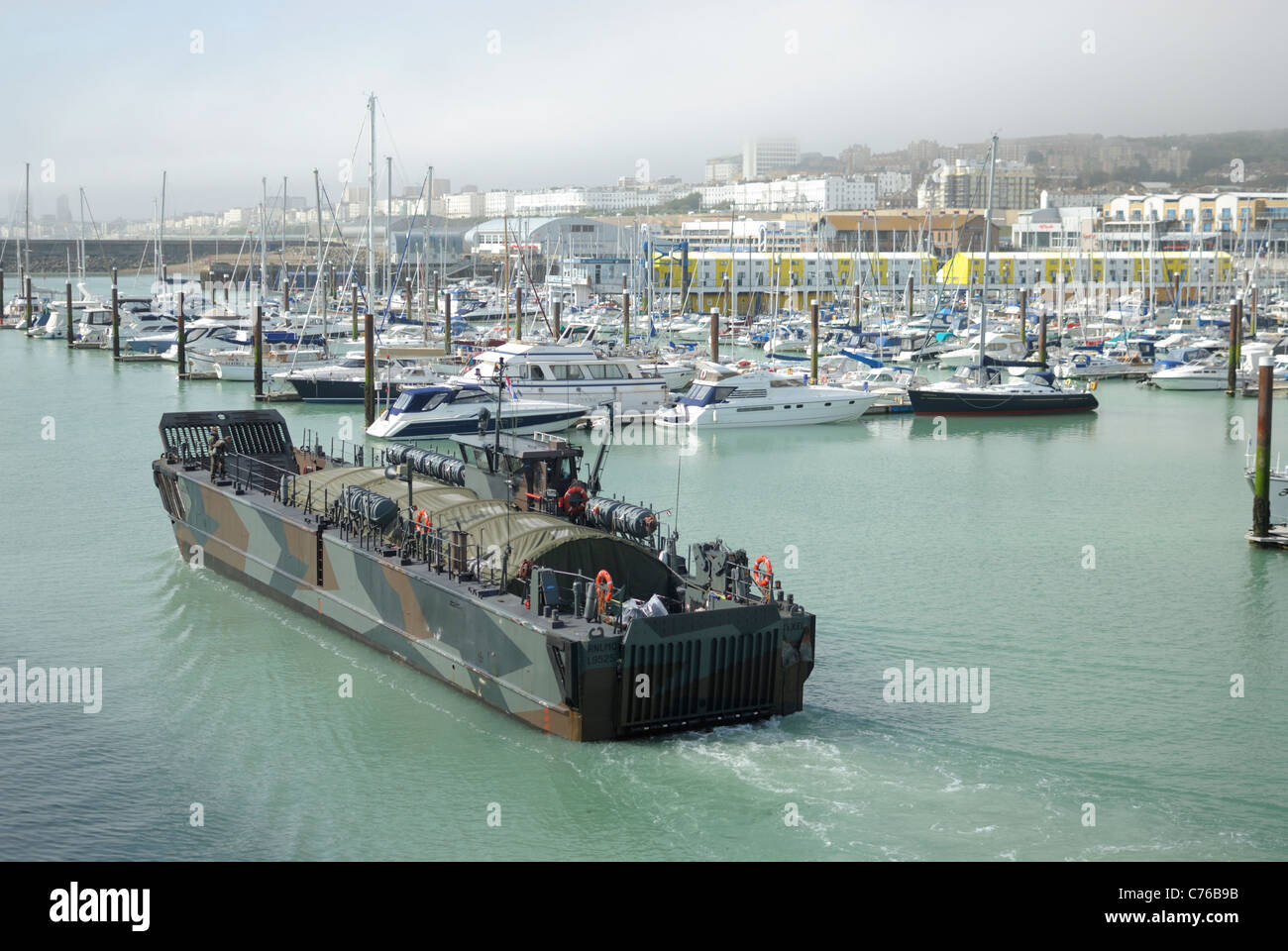 A Dutch military landing craft sailing in Brighton Marina, England. Stock Photo