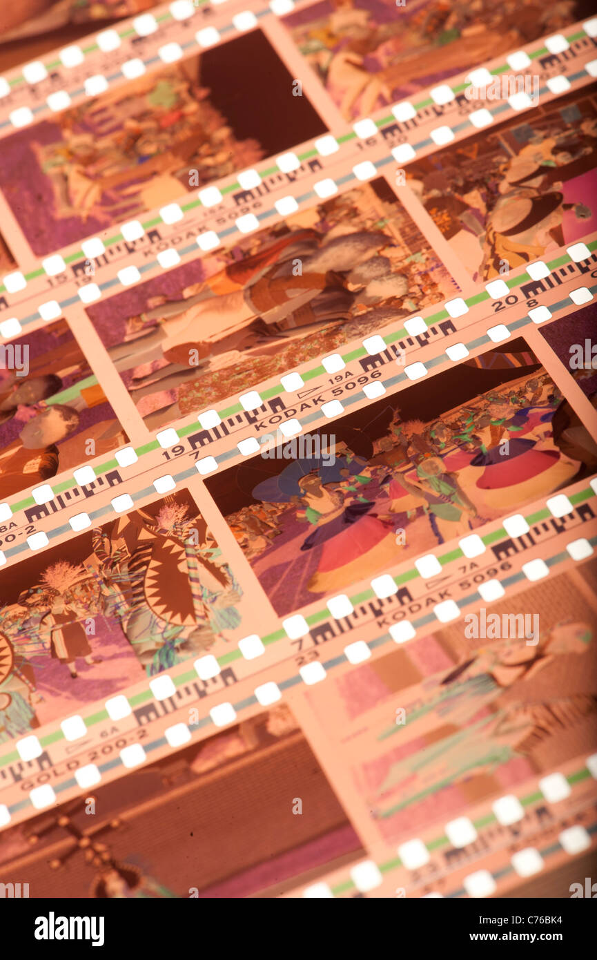 Strips of 35mm colour negative film on a light box Stock Photo