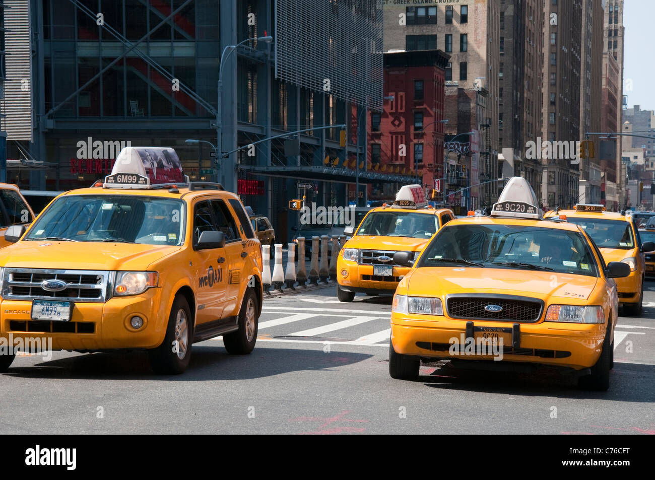 Taxis on 42nd St in New York, USA Stock Photo
