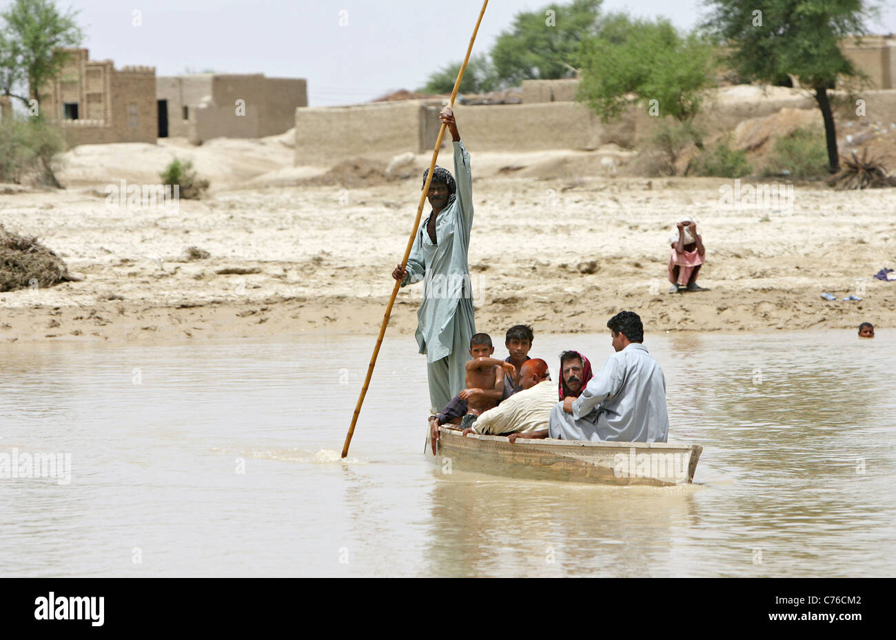 Pakistani crossing a river Dadu Pakistan Stock Photo Alamy