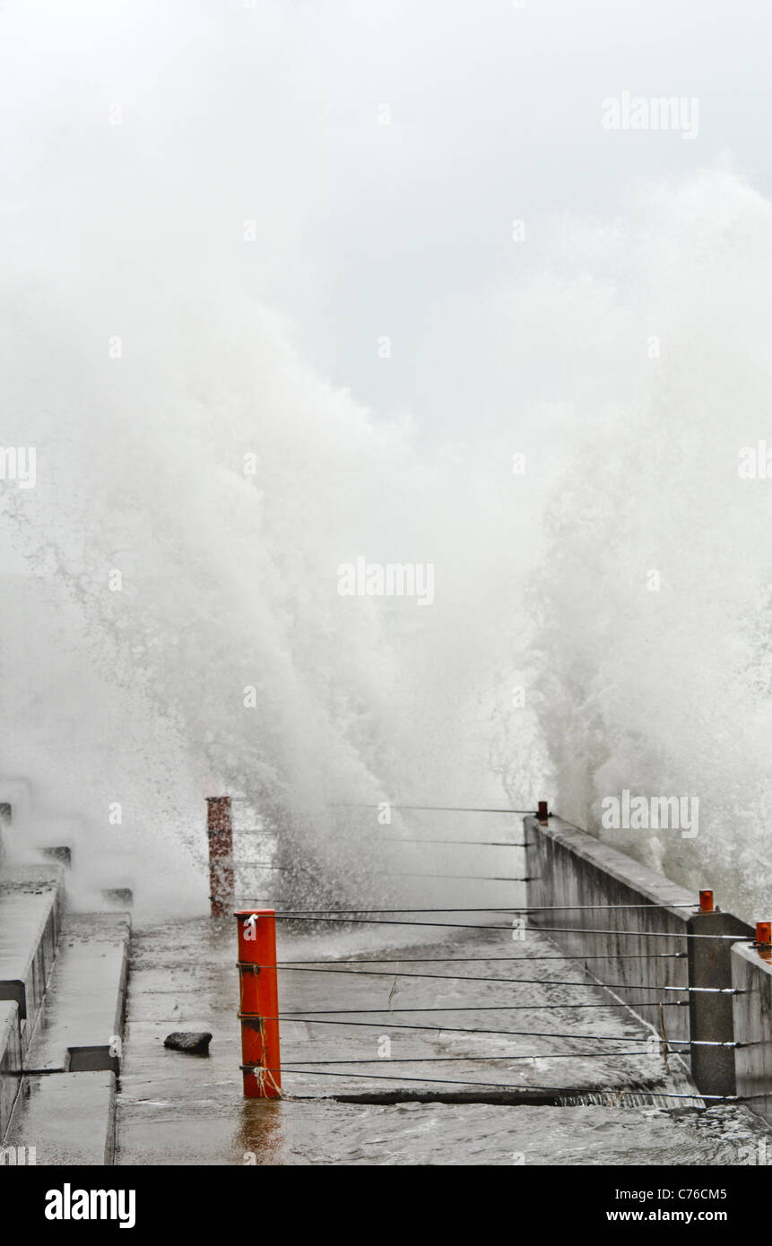 Stormy weather on sea defenses Brighton Stock Photo