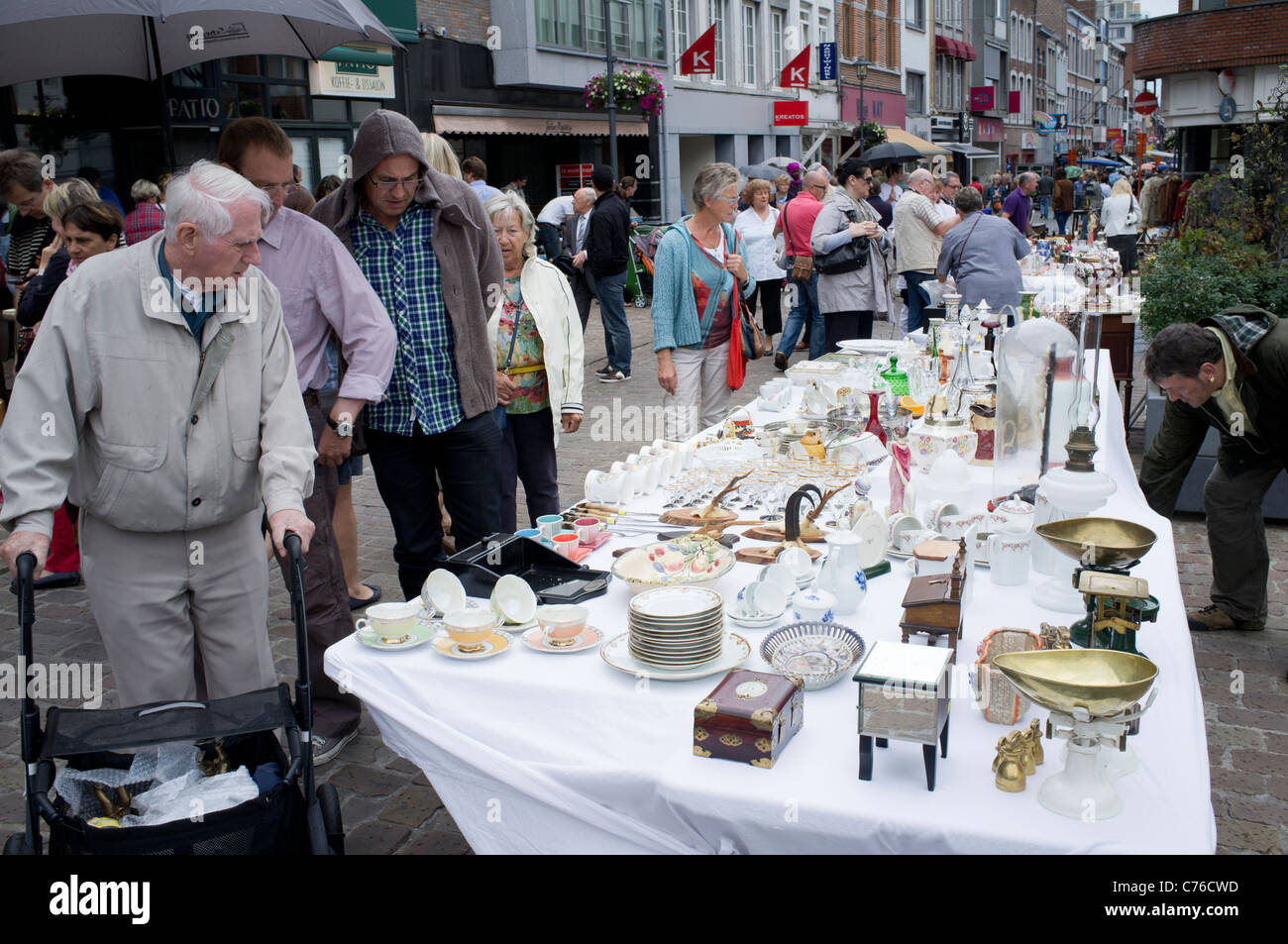 Sunday antiques market on street in Tongeren in Belgium Stock Photo