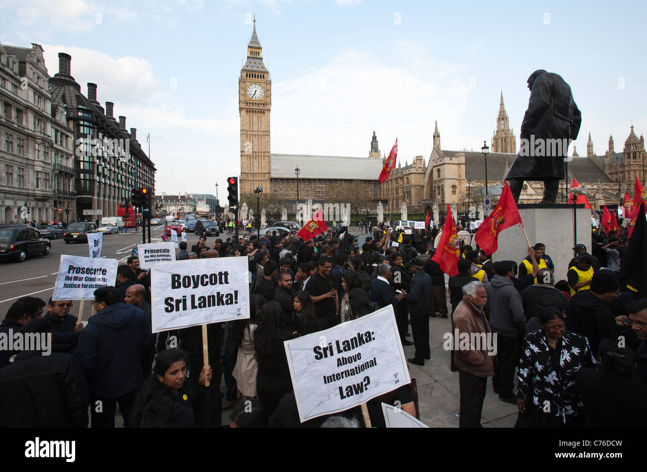 UK, London, Protestors with placards outside Houses of Parliament Stock Photo