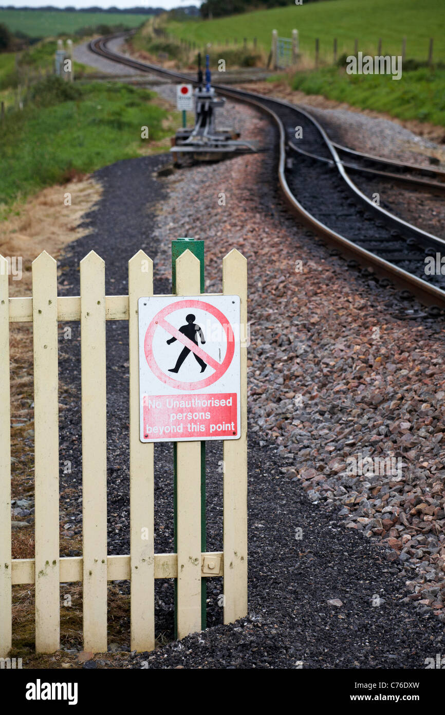No unauthorised persons beyond this point sign on fence at Killington Lane Station in August Stock Photo