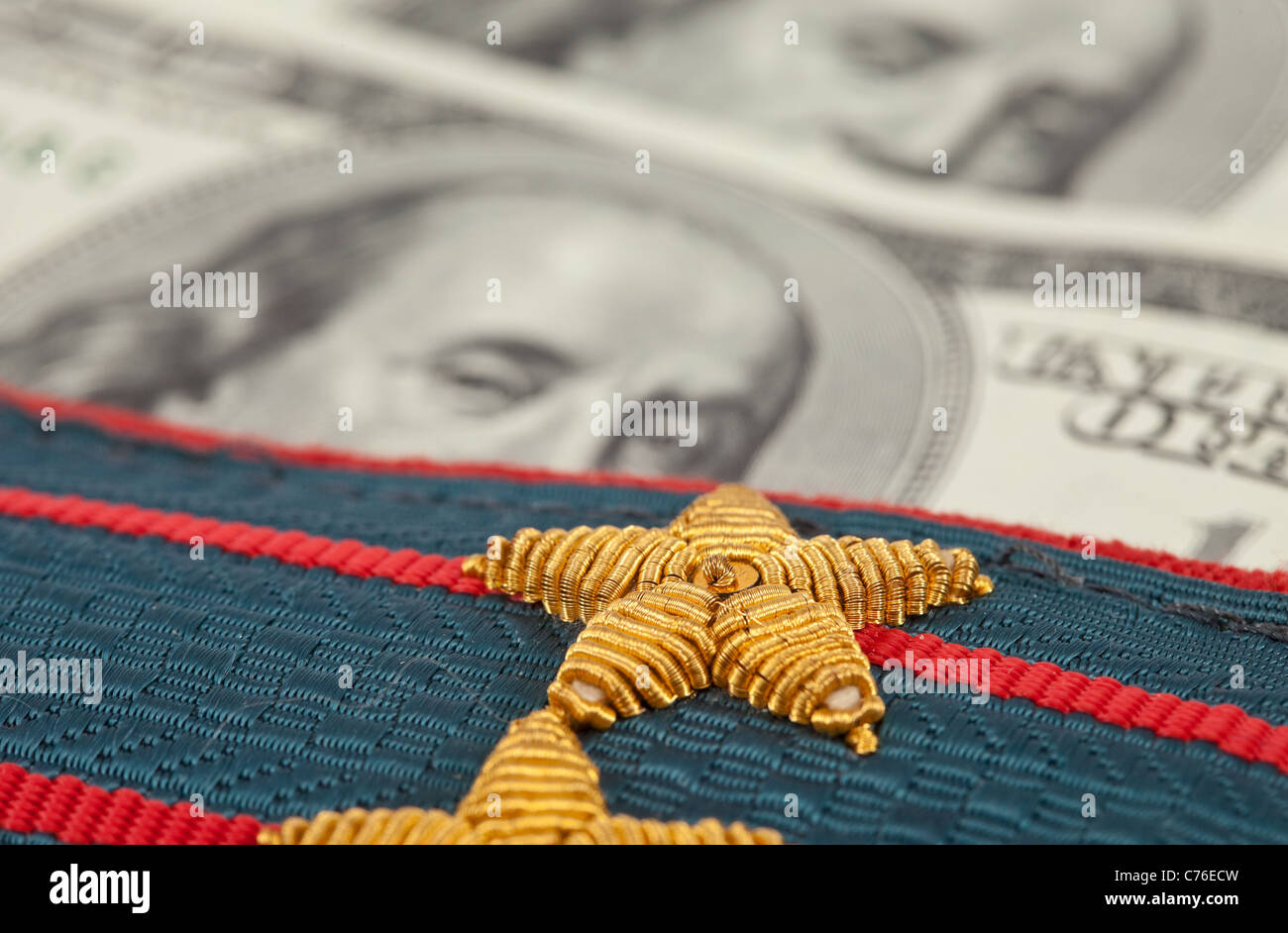 Shoulder strap of russian police on money background Stock Photo