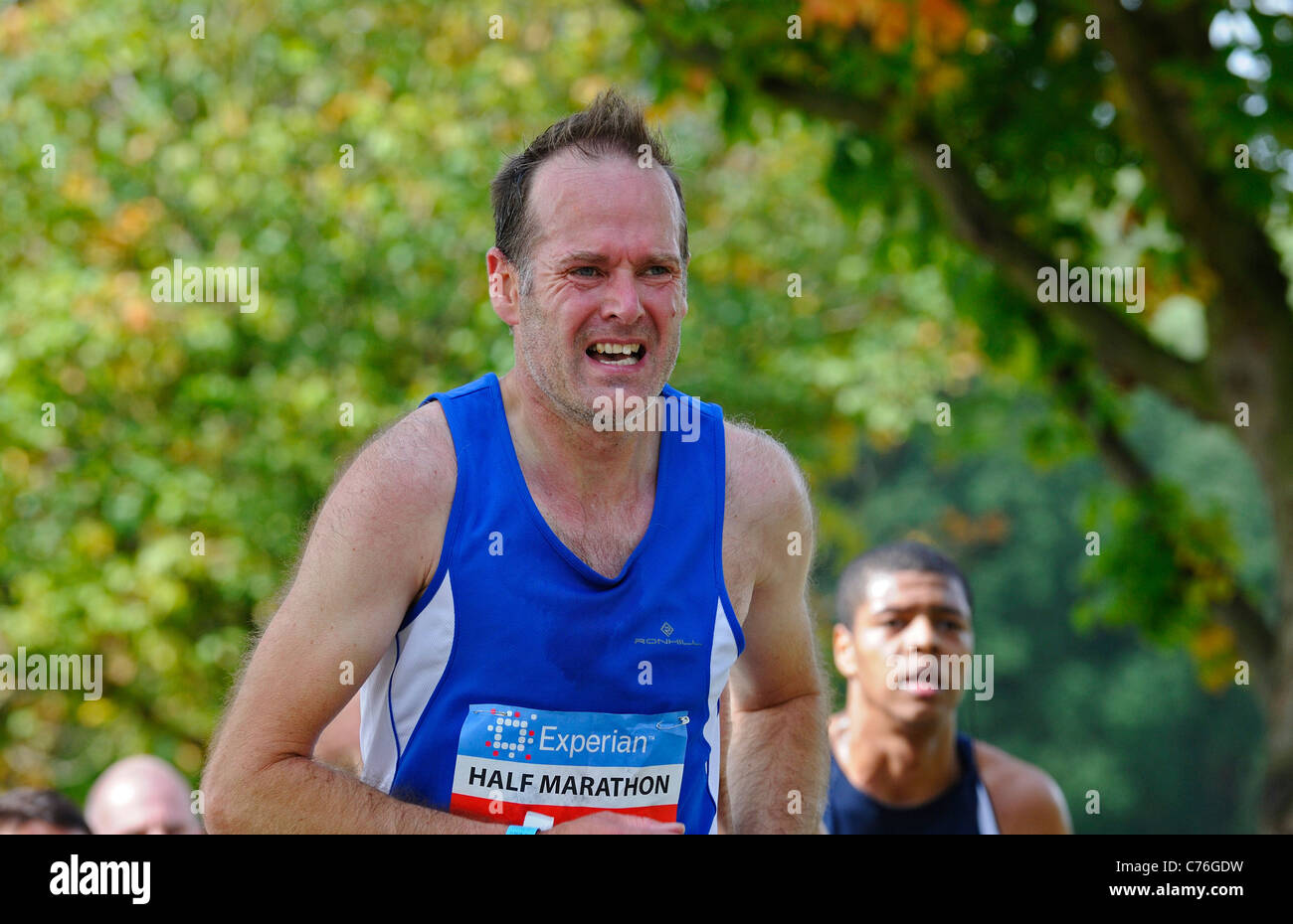 Running competitor  in the Nottingham marathon Stock Photo