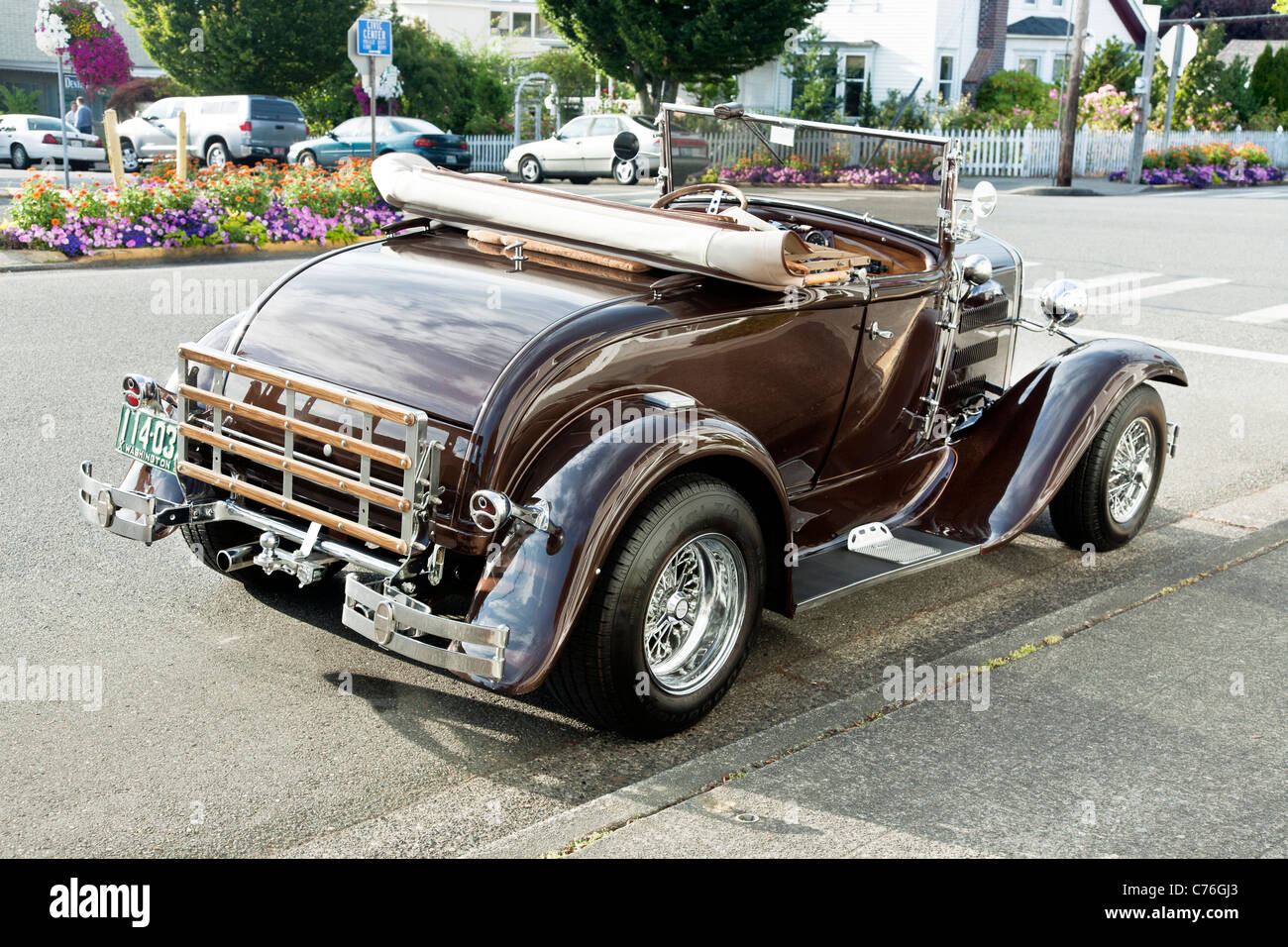 superb restored 1931 vintage chestnut brown Ford Model A cabriolet convertible car with top down parked on street Edmonds WA Stock Photo