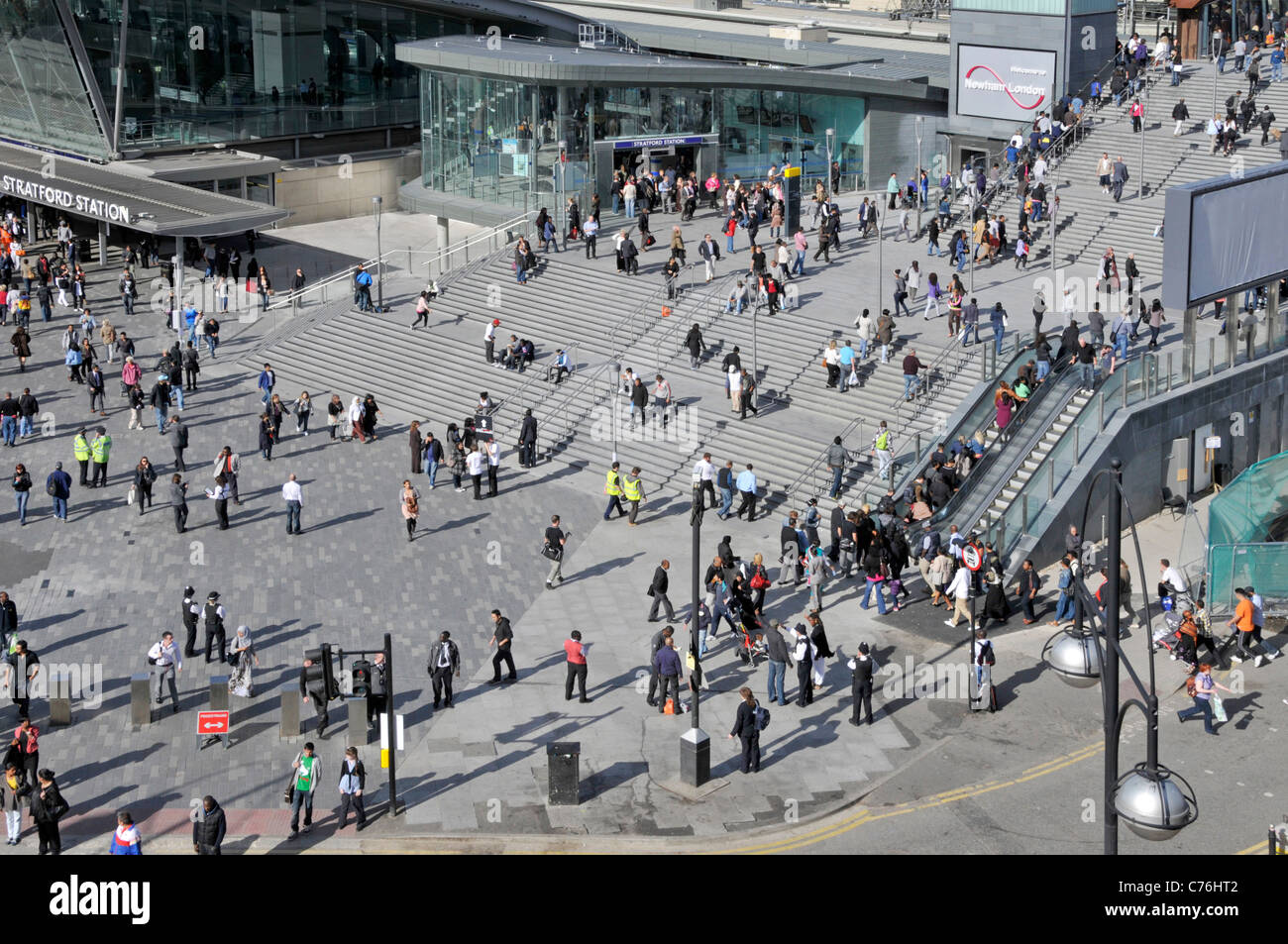 Aerial birds eye view people Stratford train station steps escalators to entrance at Westfield Shopping Centre Stratford Newham East London England UK Stock Photo