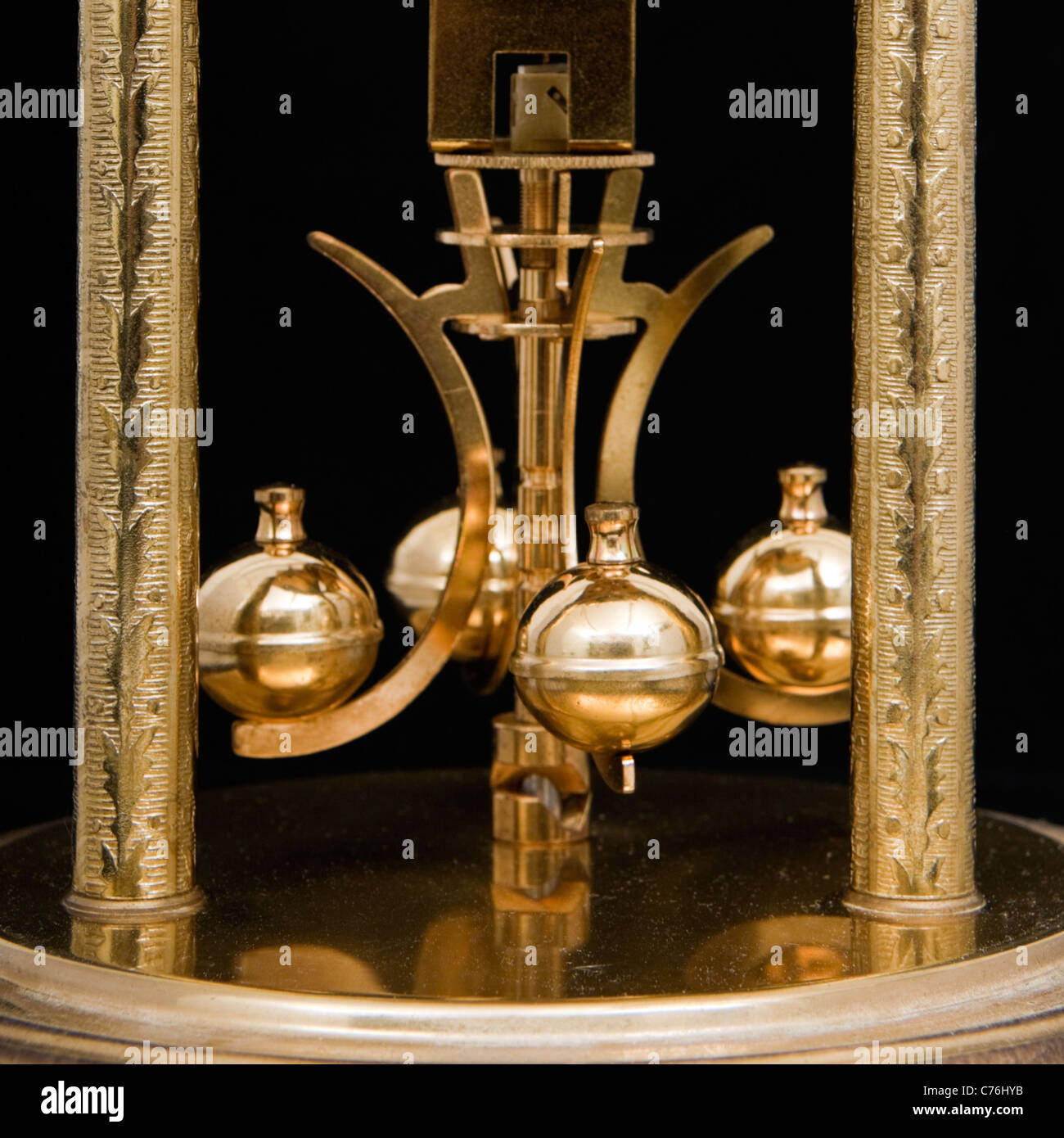 Rotary pendulum of a vintage Haller dome torsion clock Stock Photo