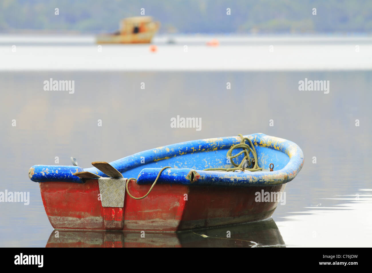 An old boat sits in the harbor at Lauragh, Beara Peninsula, Co Cork, Rep of Ireland. Stock Photo