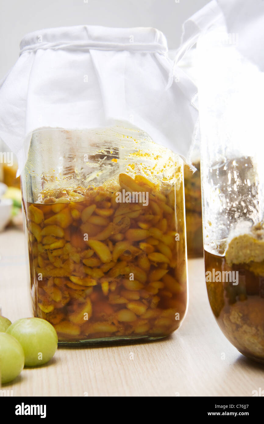 Jar filled with garlic pickle Stock Photo