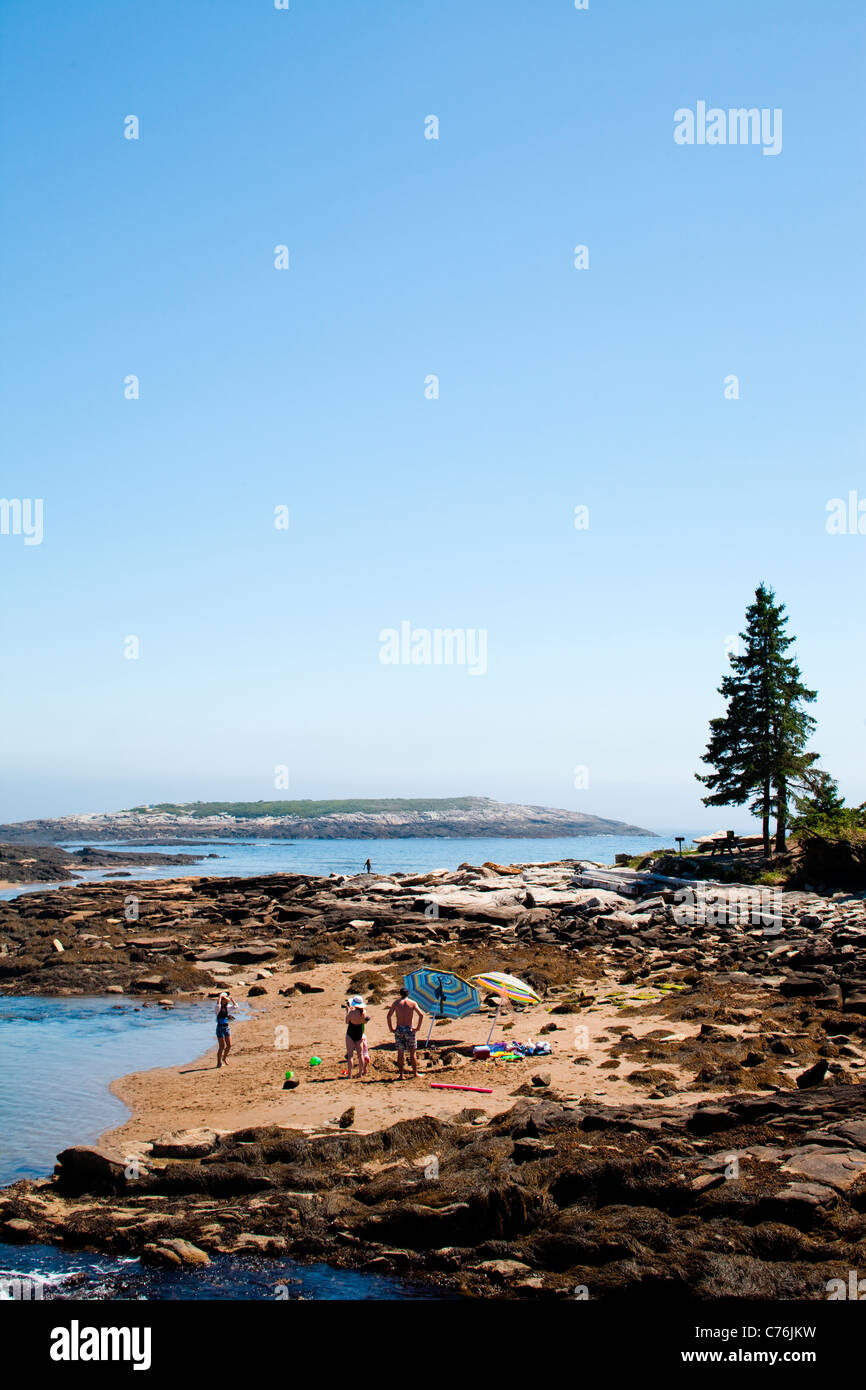 A family enjoys a sunny afternoon in a coastal state park. Stock Photo