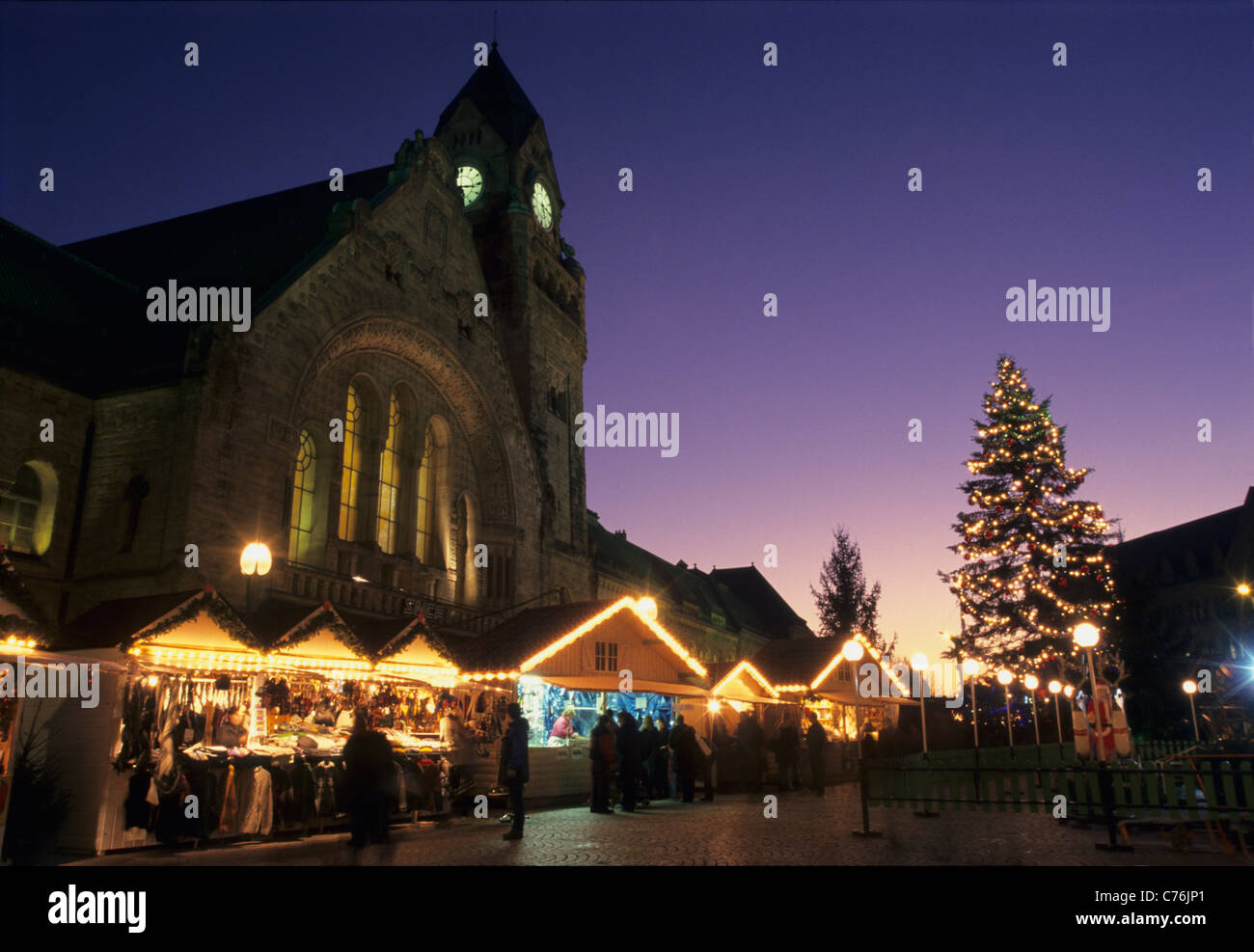 Christmas market on General de Gaulle  place, front of historic railway station building, Metz, Lorraine, France Stock Photo