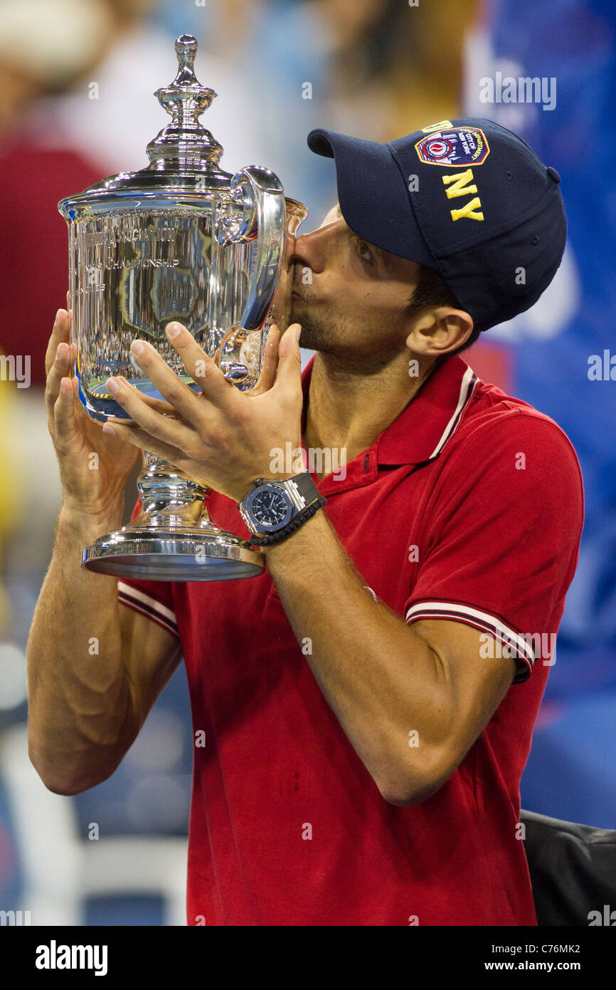 Novak Djokovic (SRB) winner of the Men's Final with his trophy at the 2011 US Open Tennis Championships. Stock Photo